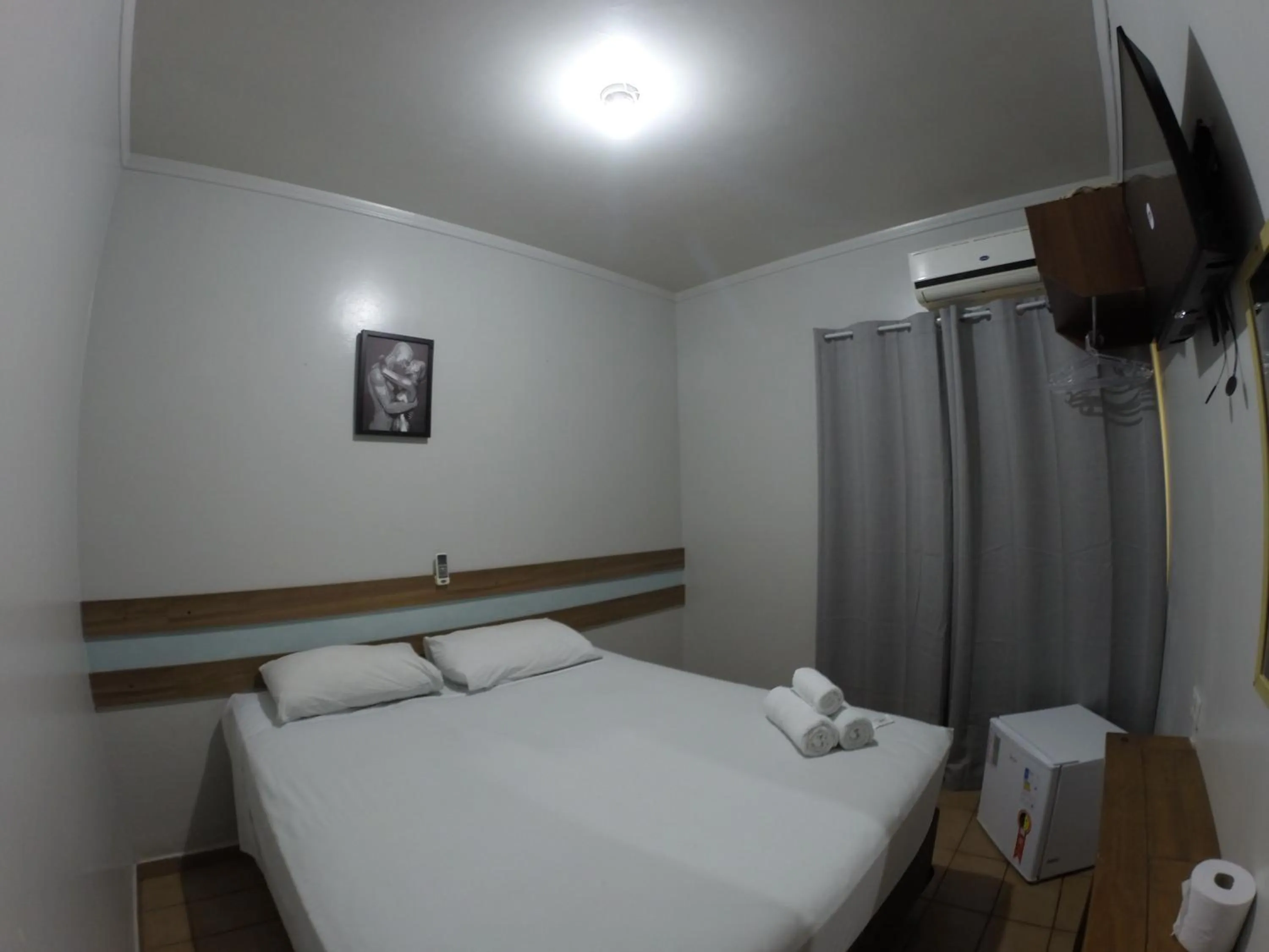 Bed in POUSADA EVELINA