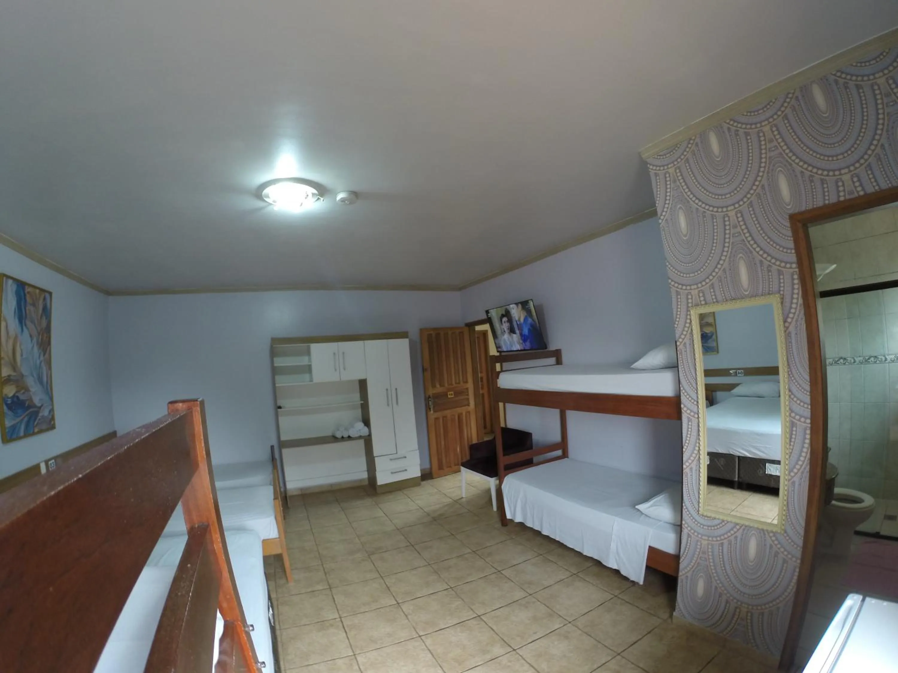 Bed in POUSADA EVELINA