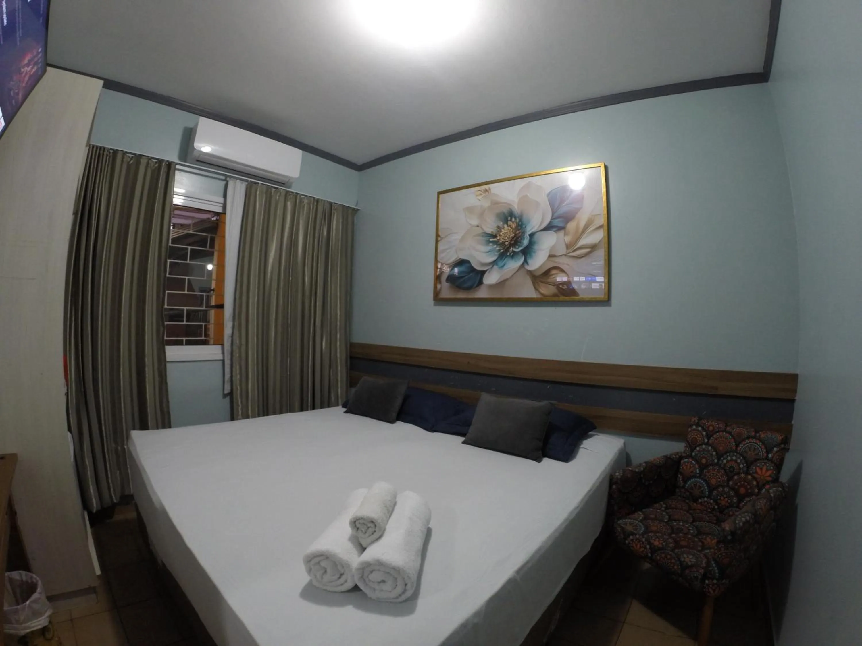 Bed in POUSADA EVELINA