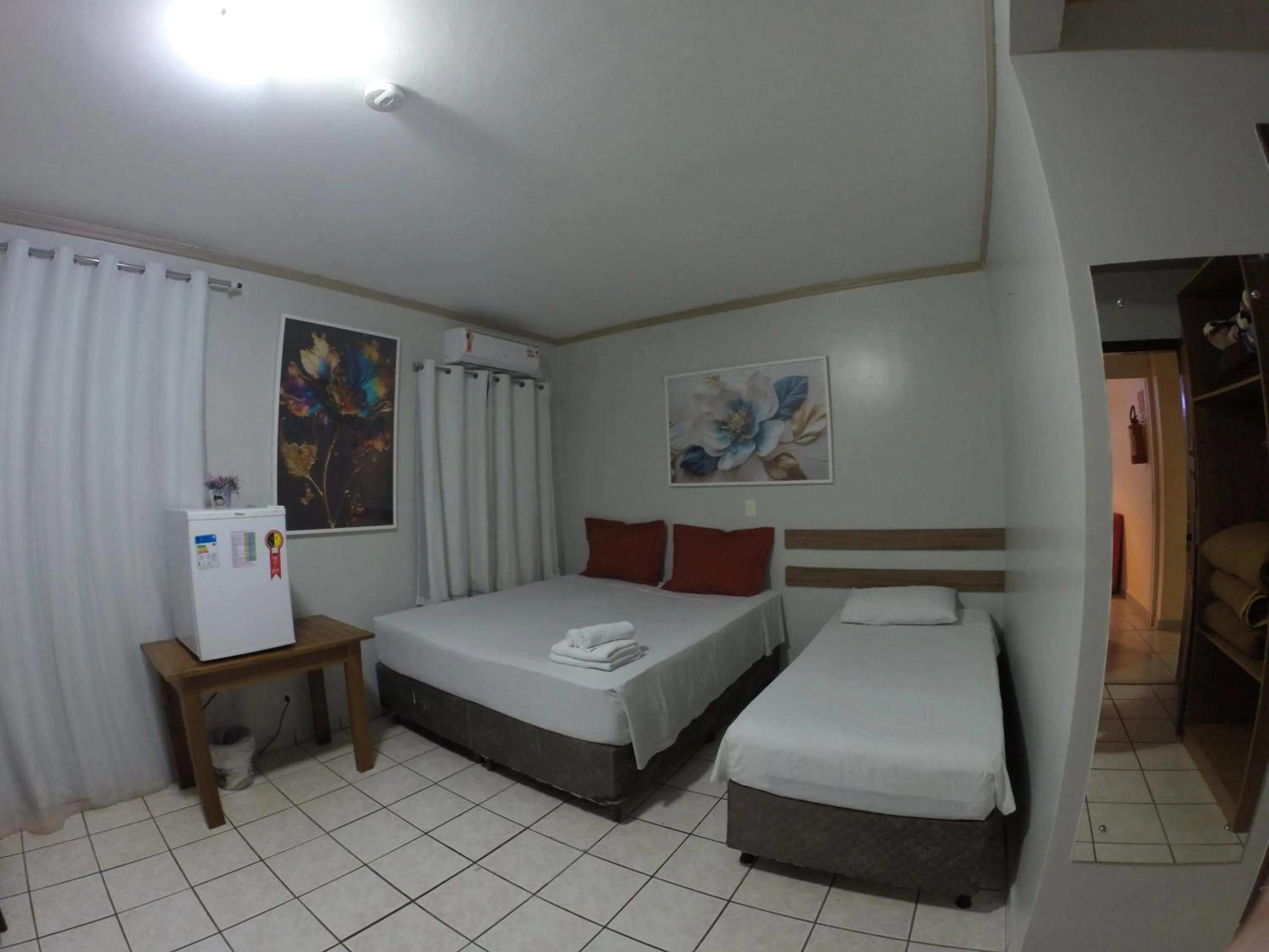 Bed in POUSADA EVELINA