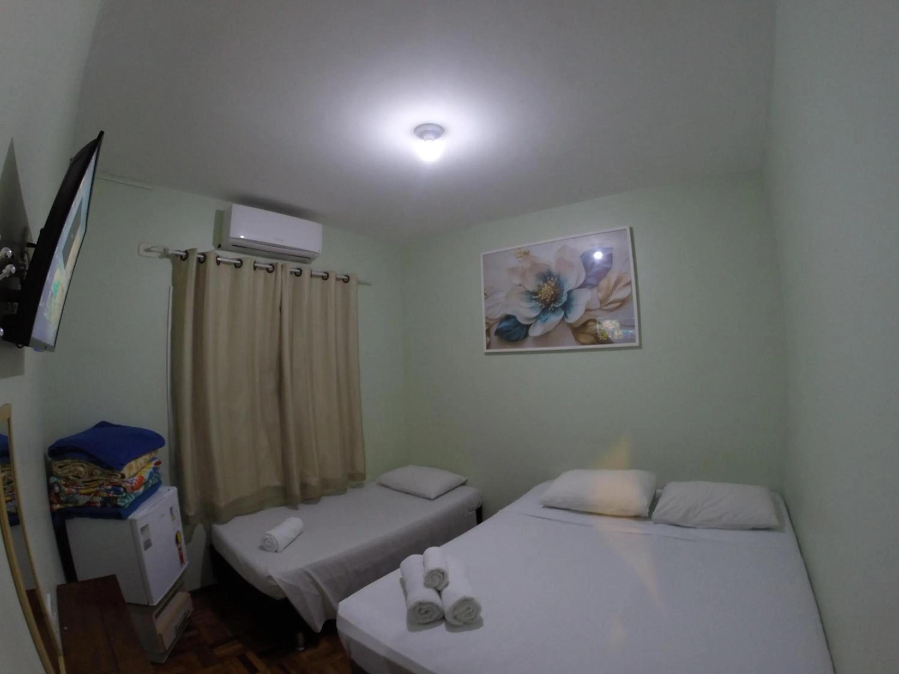 Bed in POUSADA EVELINA