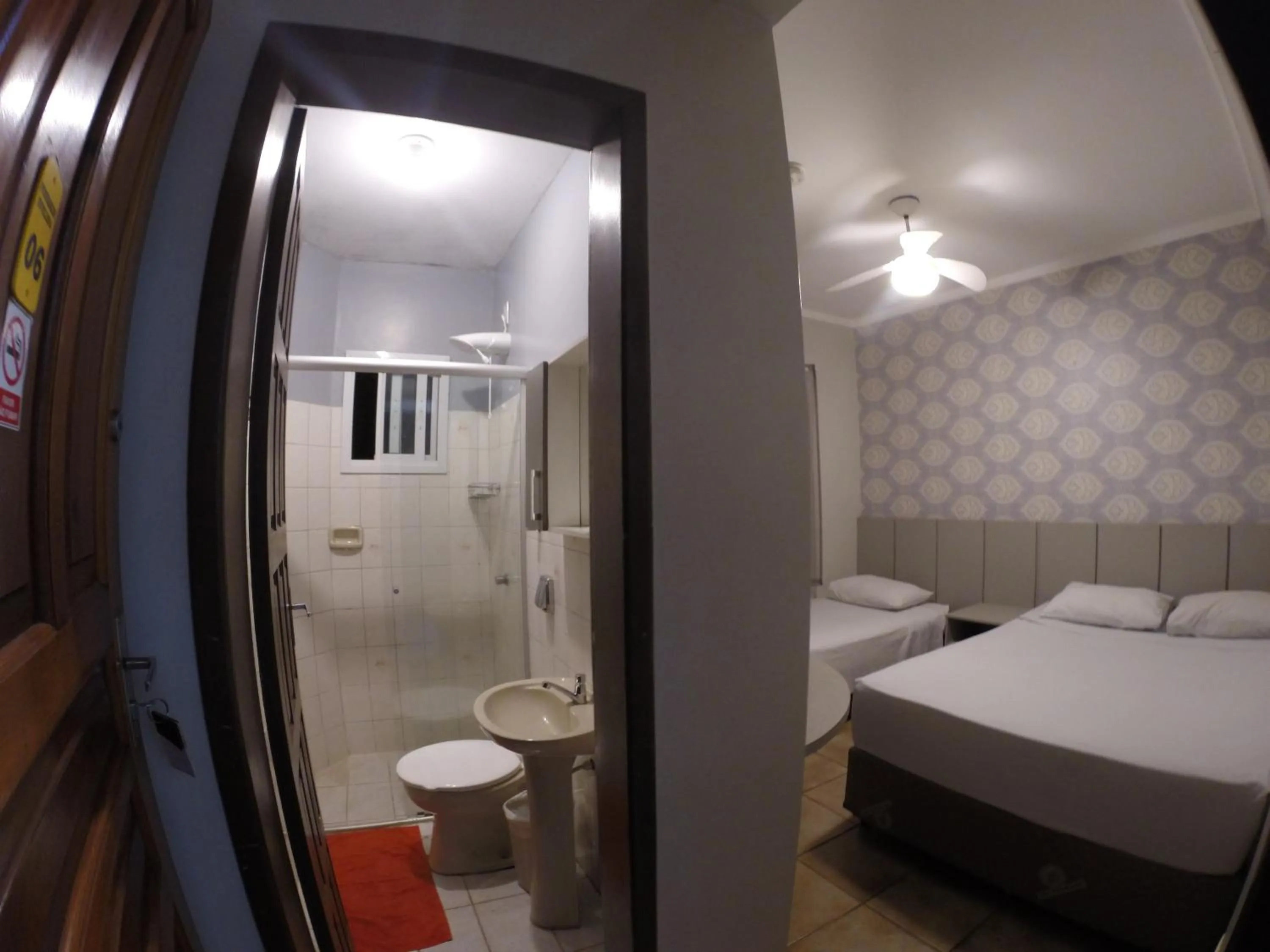 Bed in POUSADA EVELINA