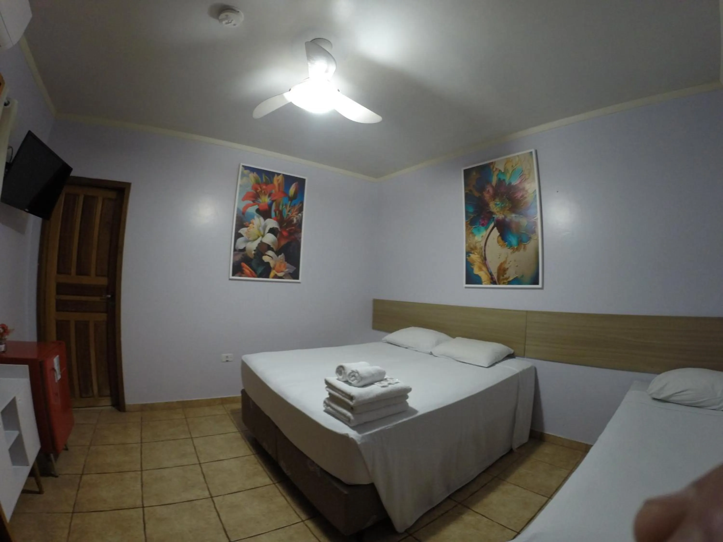 Bed in POUSADA EVELINA