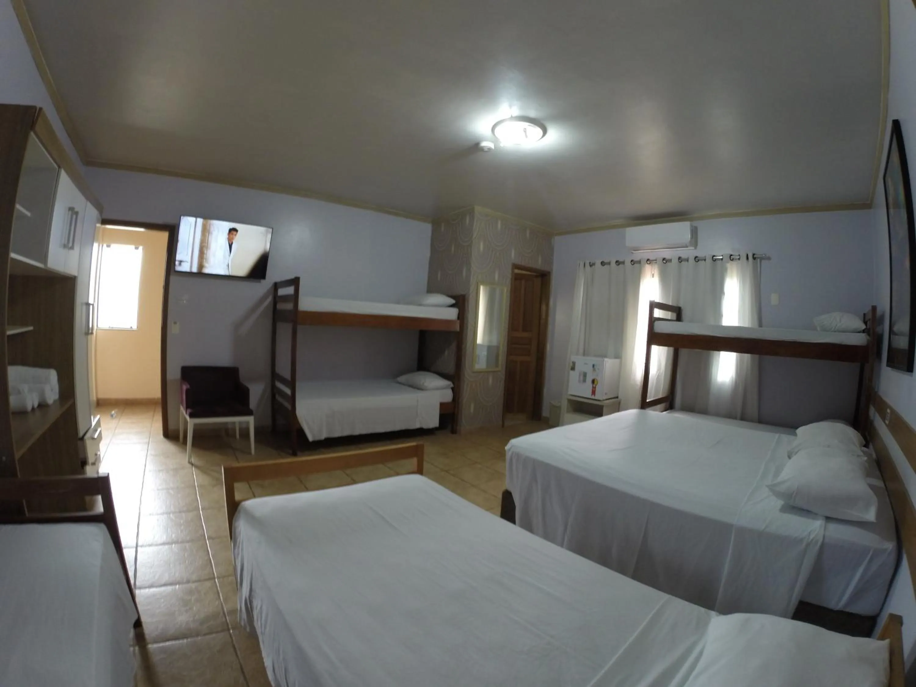 Bed in POUSADA EVELINA