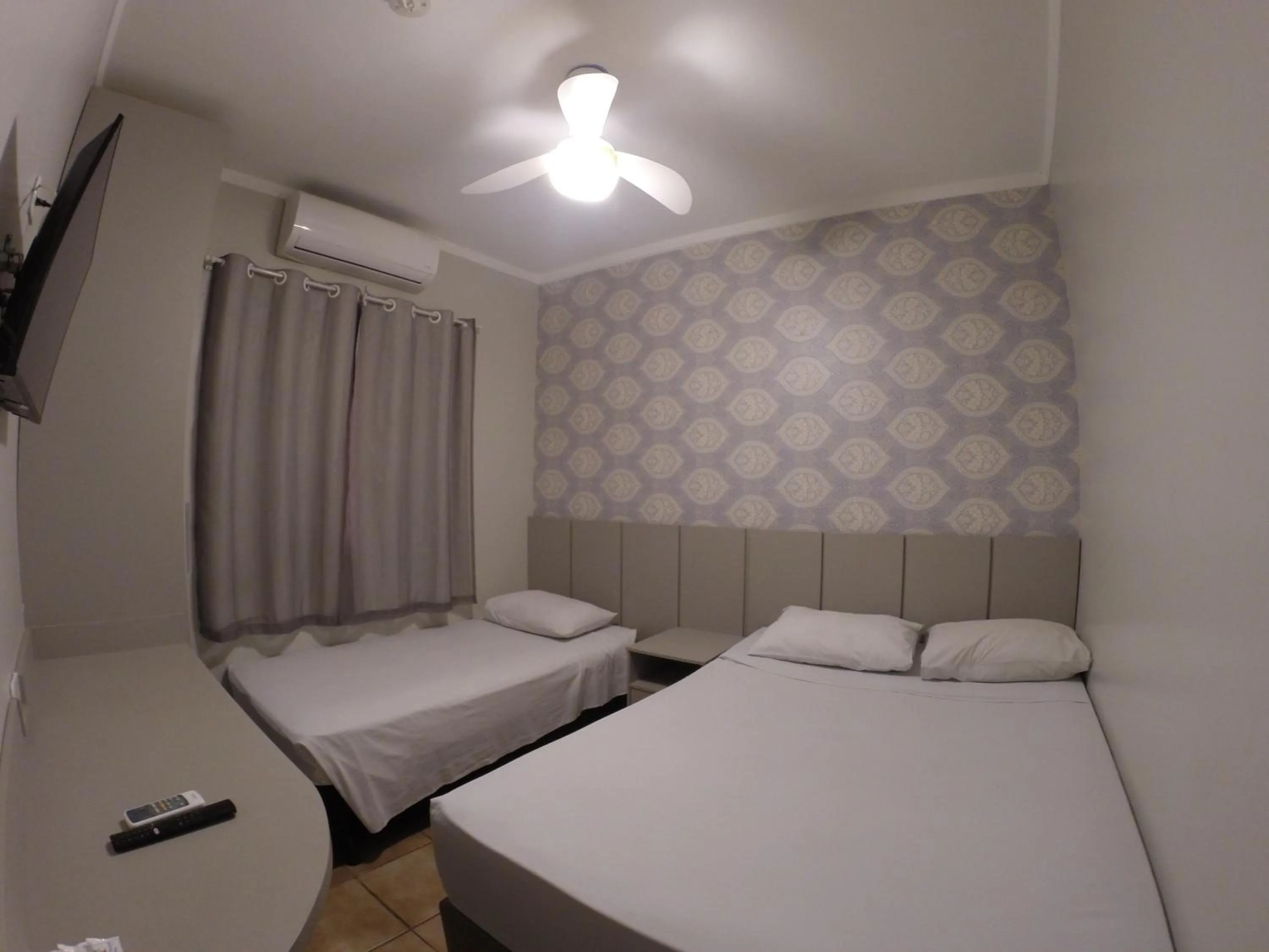 Bed in POUSADA EVELINA