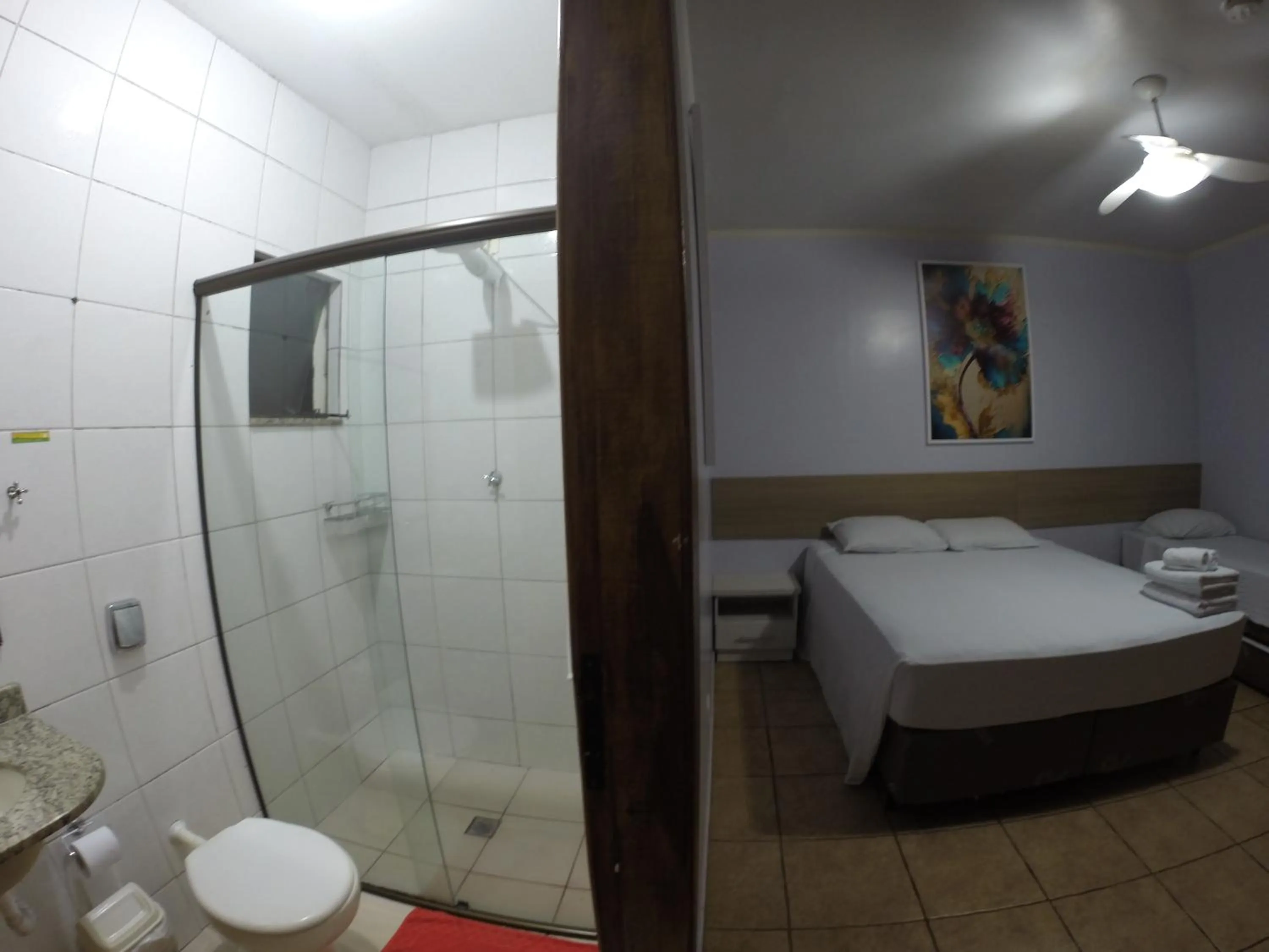 Bed in POUSADA EVELINA