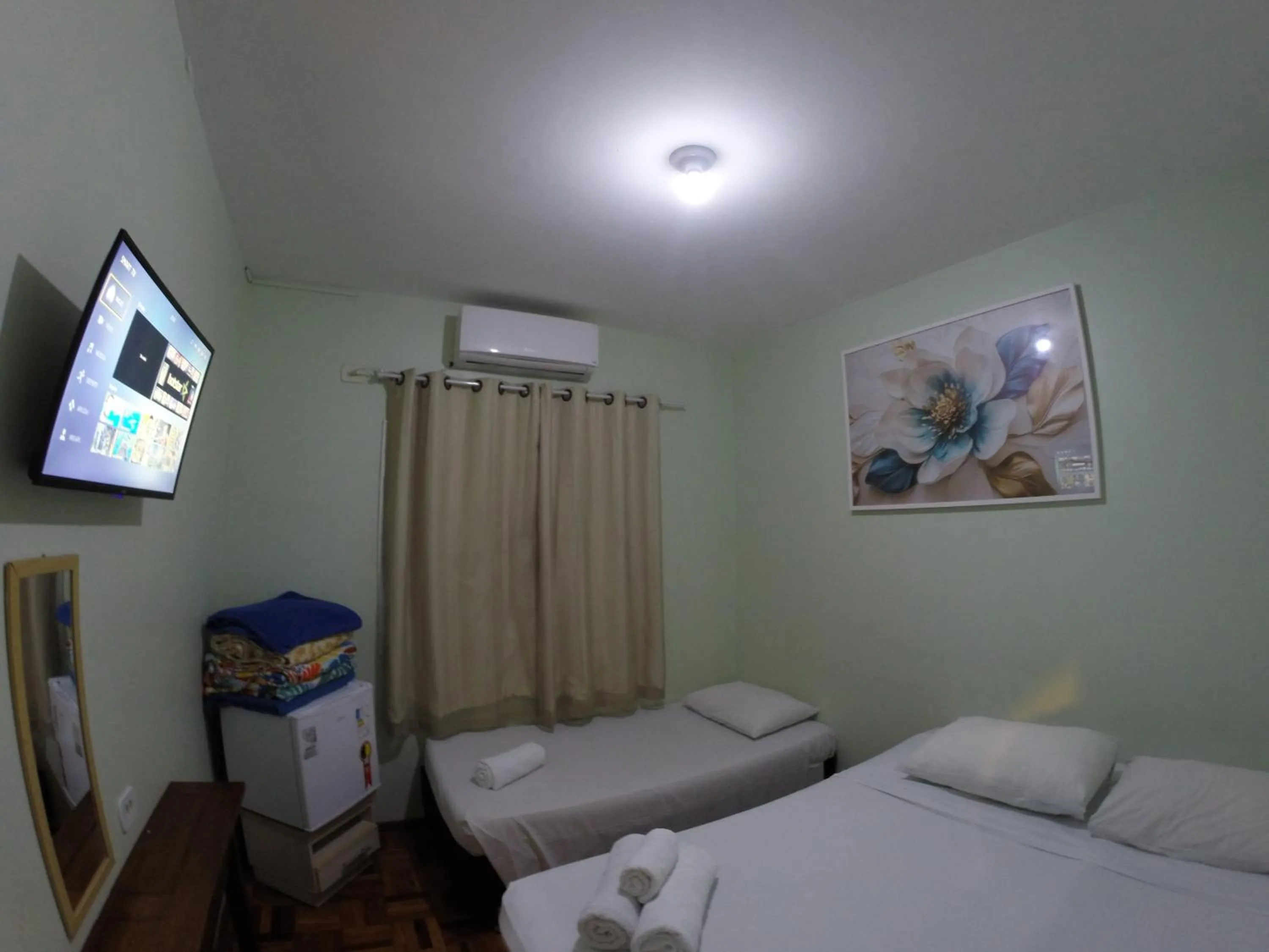 Bed in POUSADA EVELINA