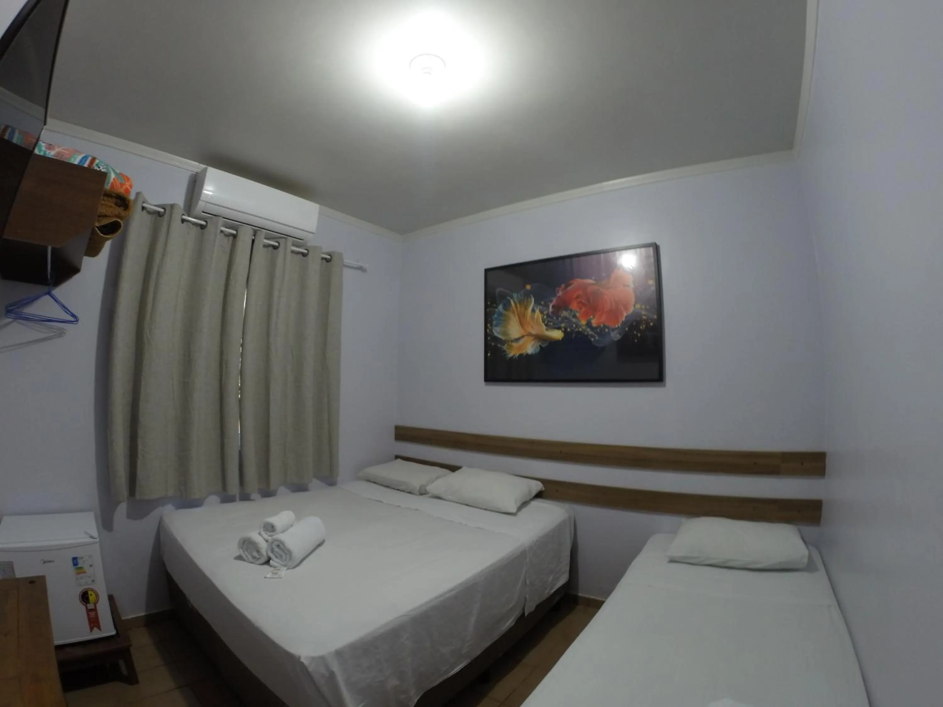 Bed in POUSADA EVELINA