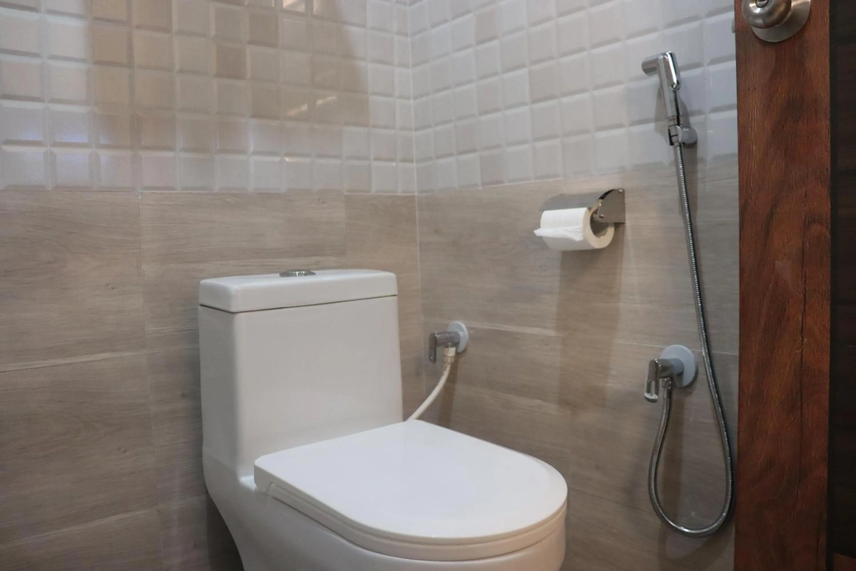 Toilet in Paradise Inn