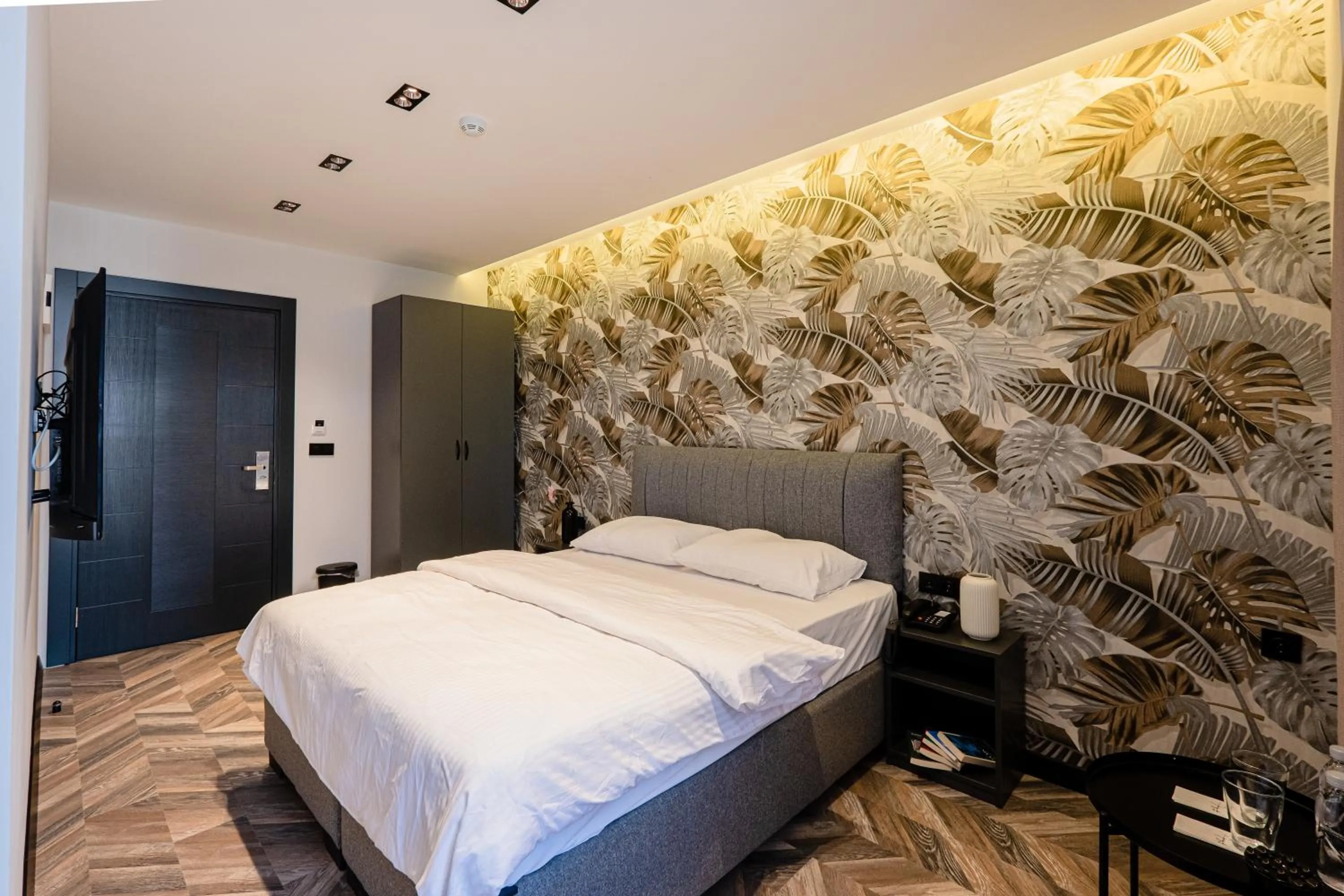 Bed in Angelo Coffee Suites