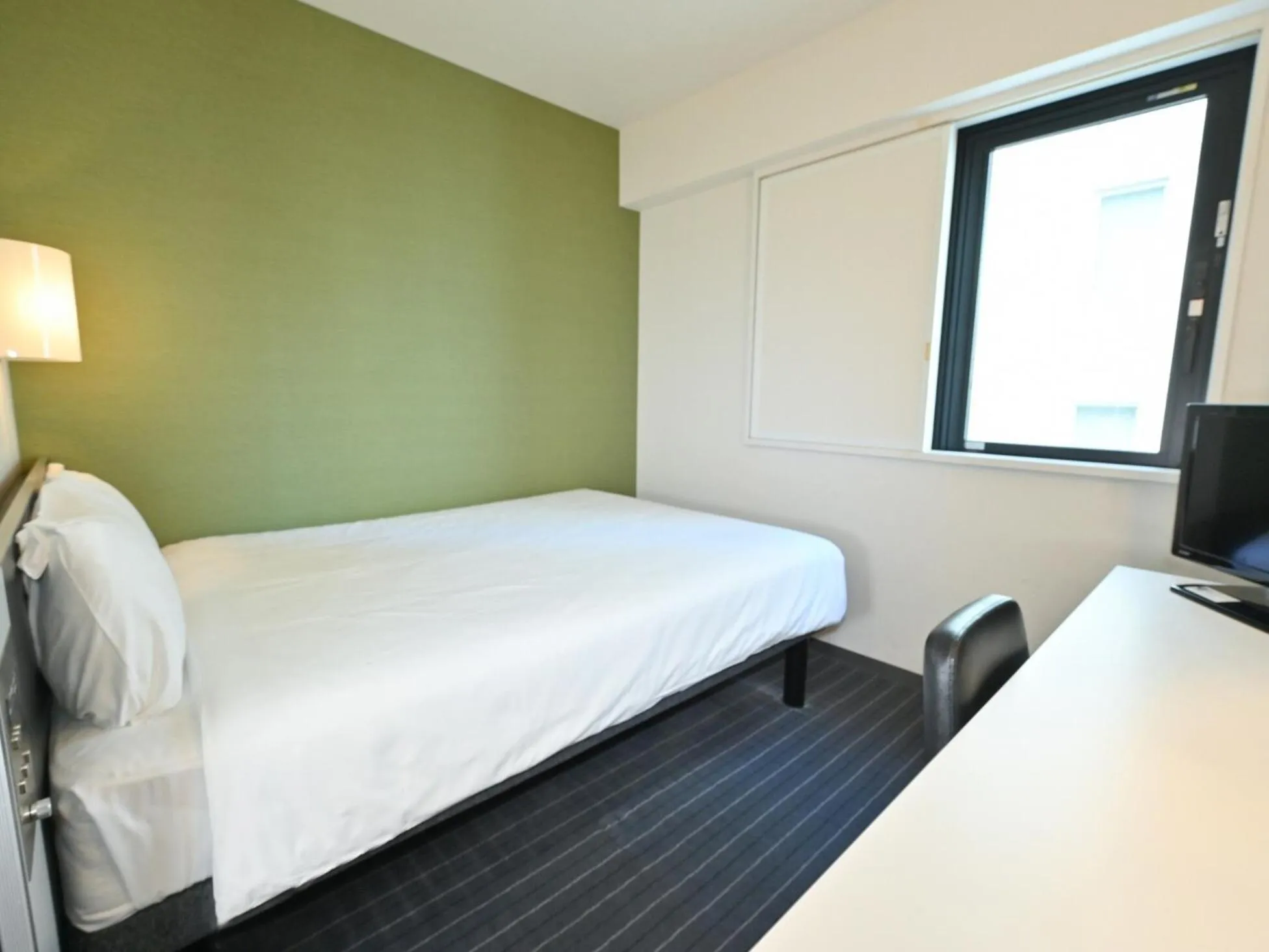 Photo of the whole room, Bed in Sanco Inn Nagoya Fushimi