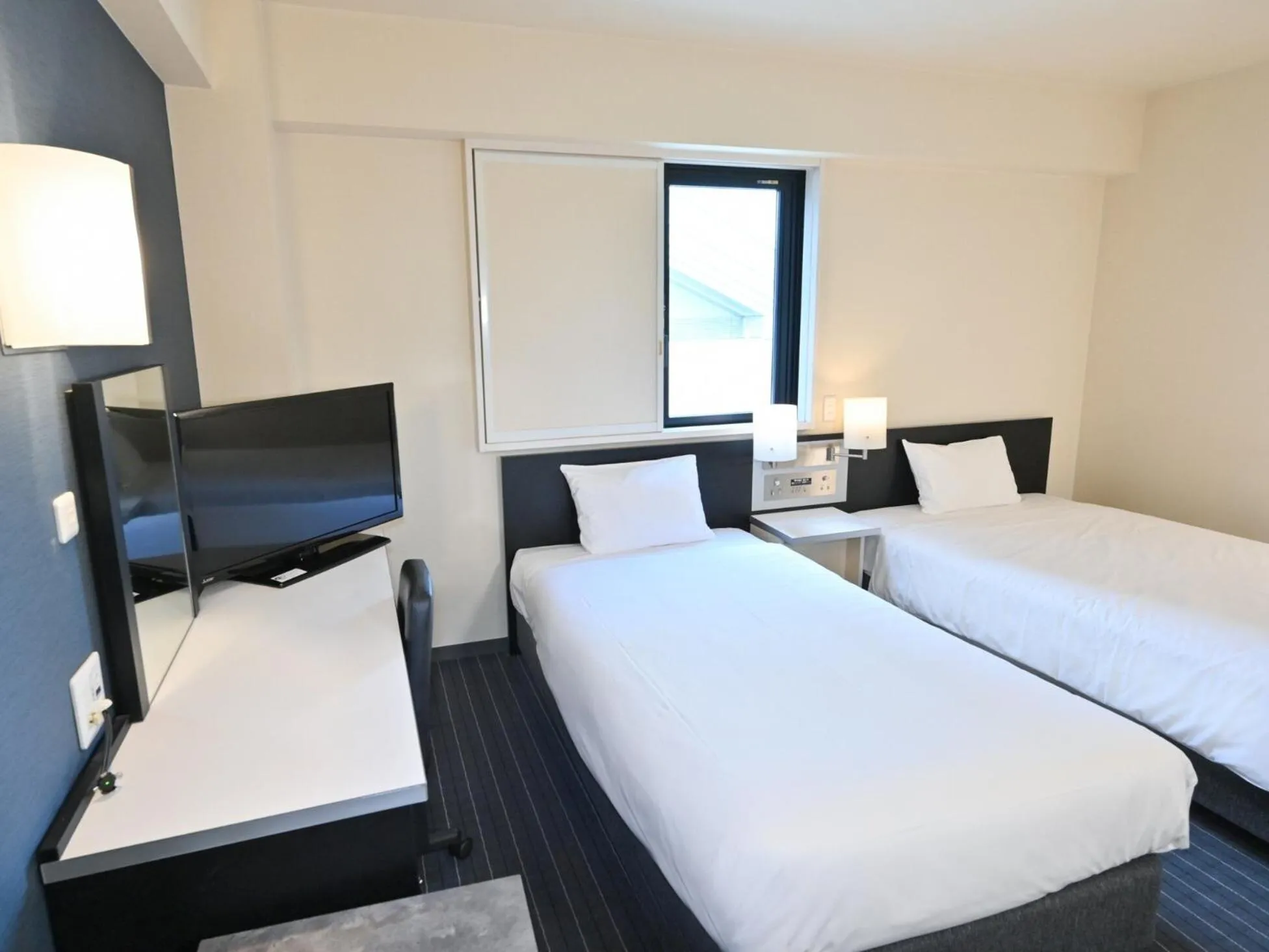 Photo of the whole room, Bed in Sanco Inn Nagoya Fushimi