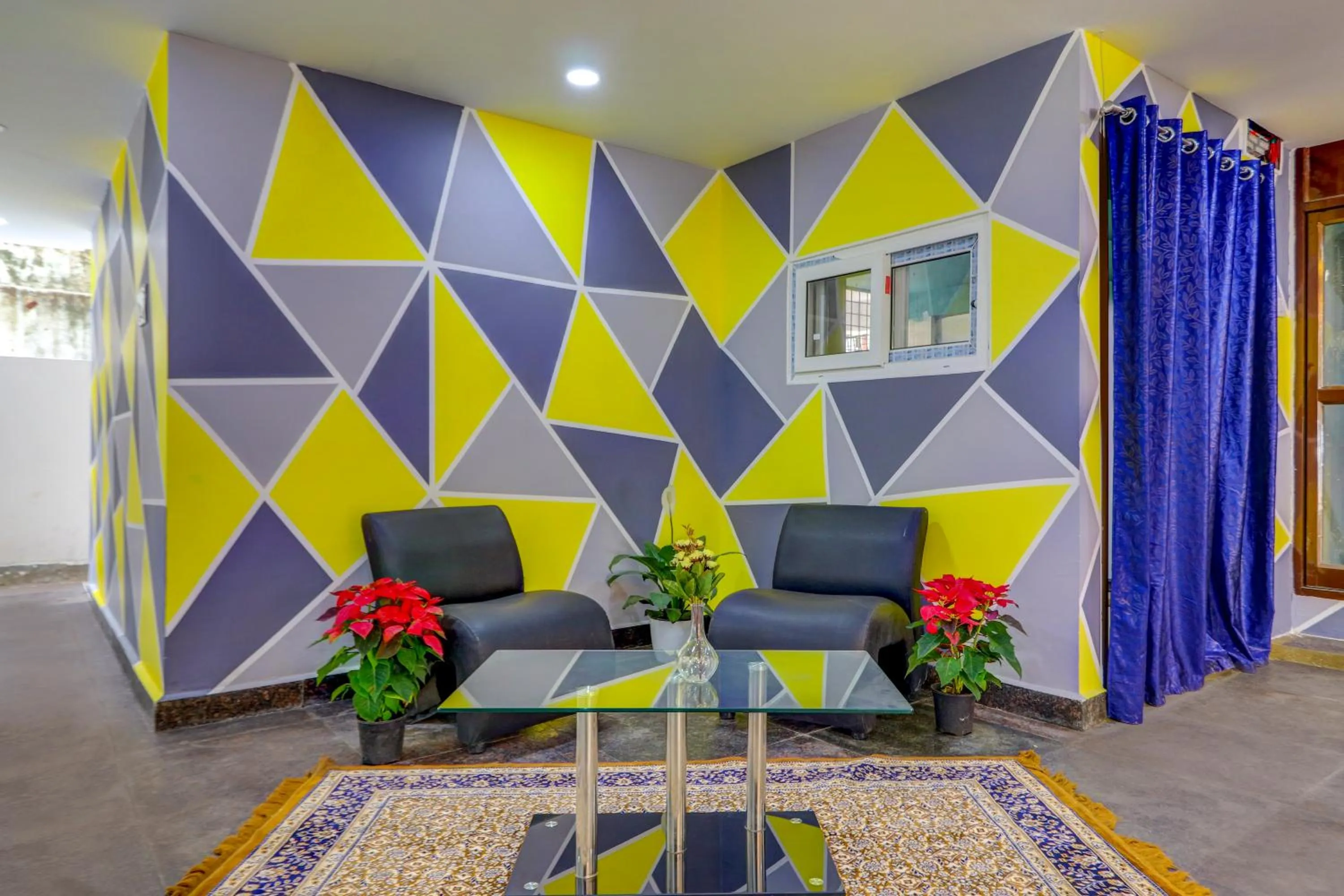 Seating area in Destino By INR Suites