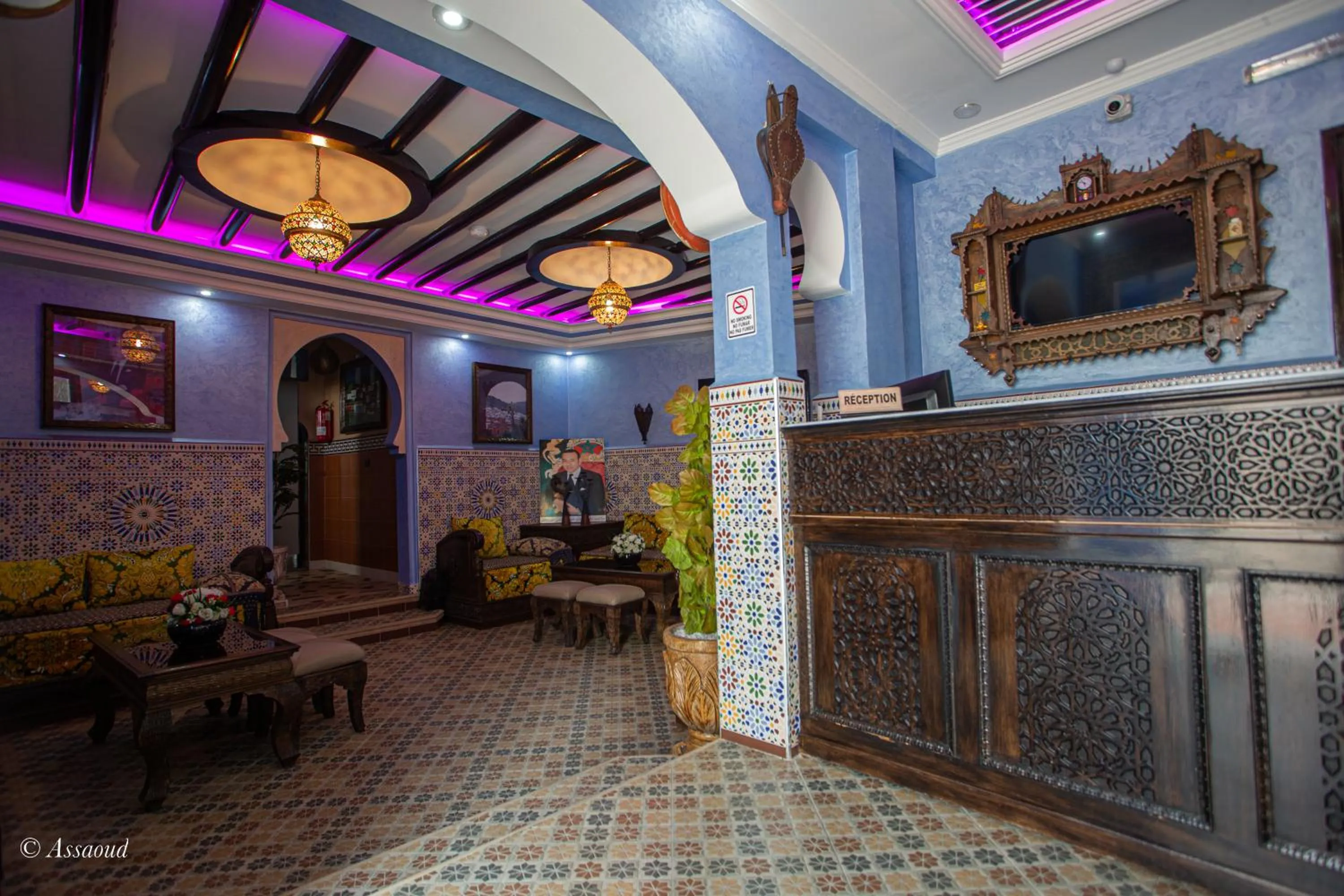 Communal lounge/ TV room in Maison d'hôtes Afassi