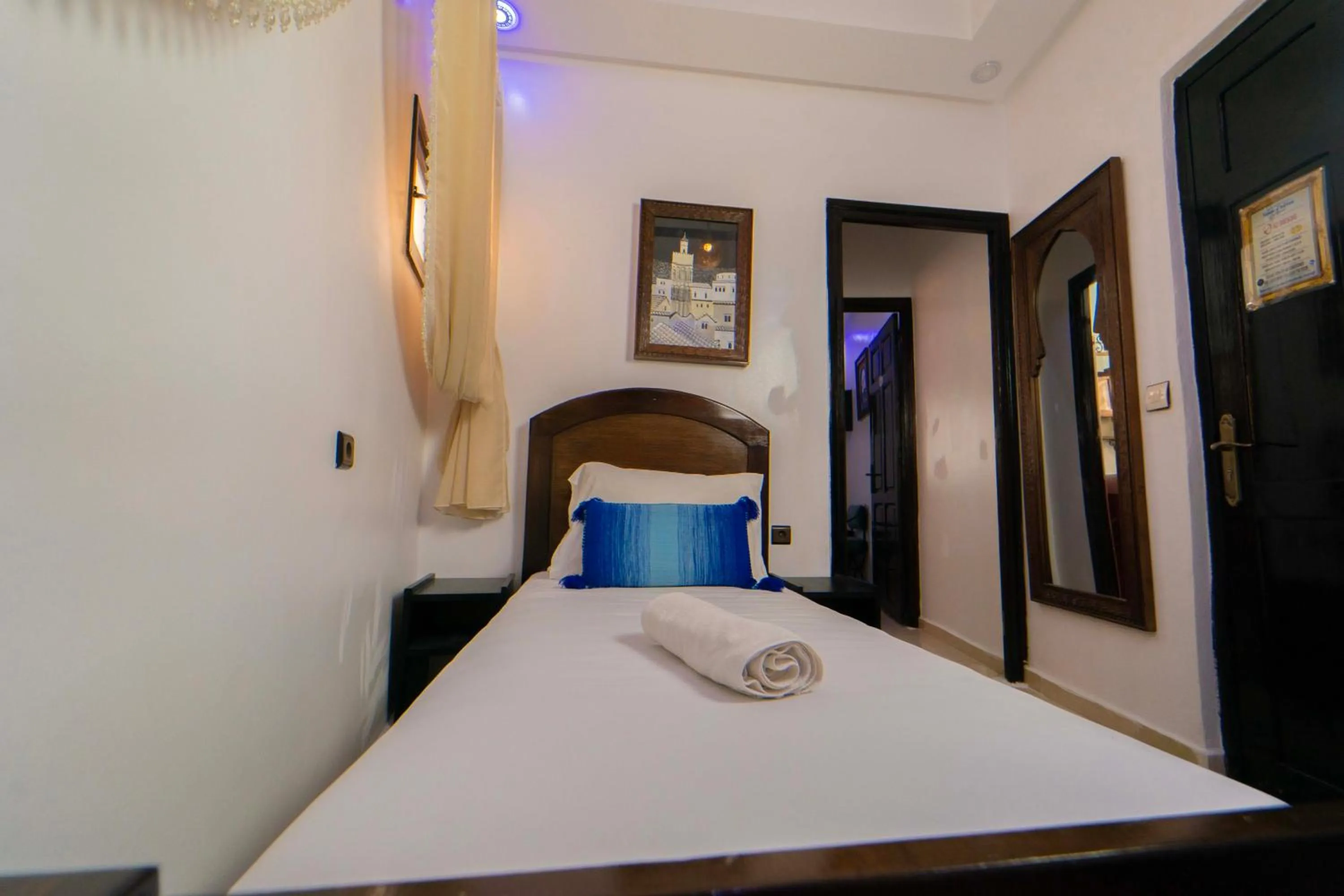 Bed in Maison d'hôtes Afassi