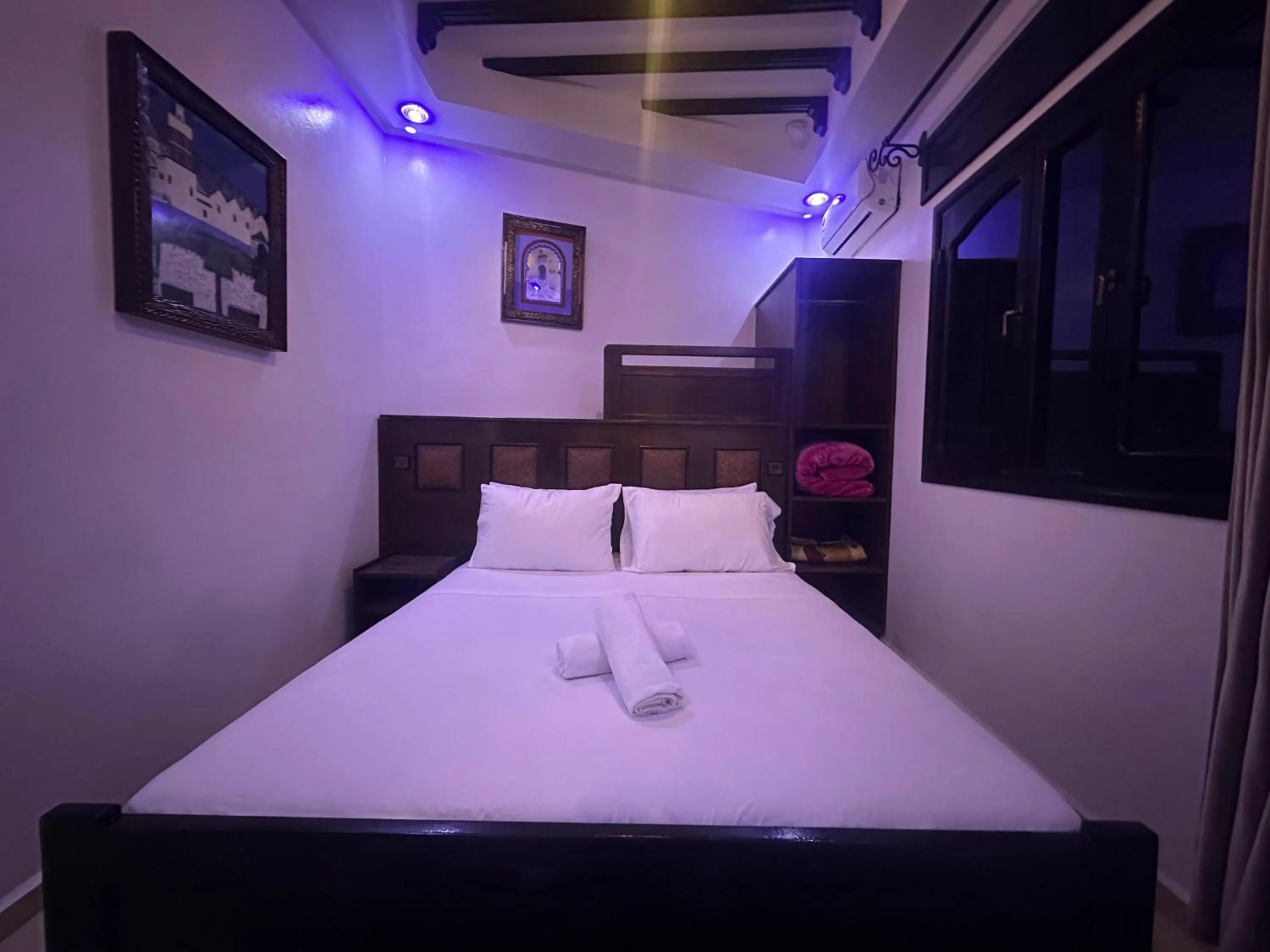 Bed in Maison d'hôtes Afassi