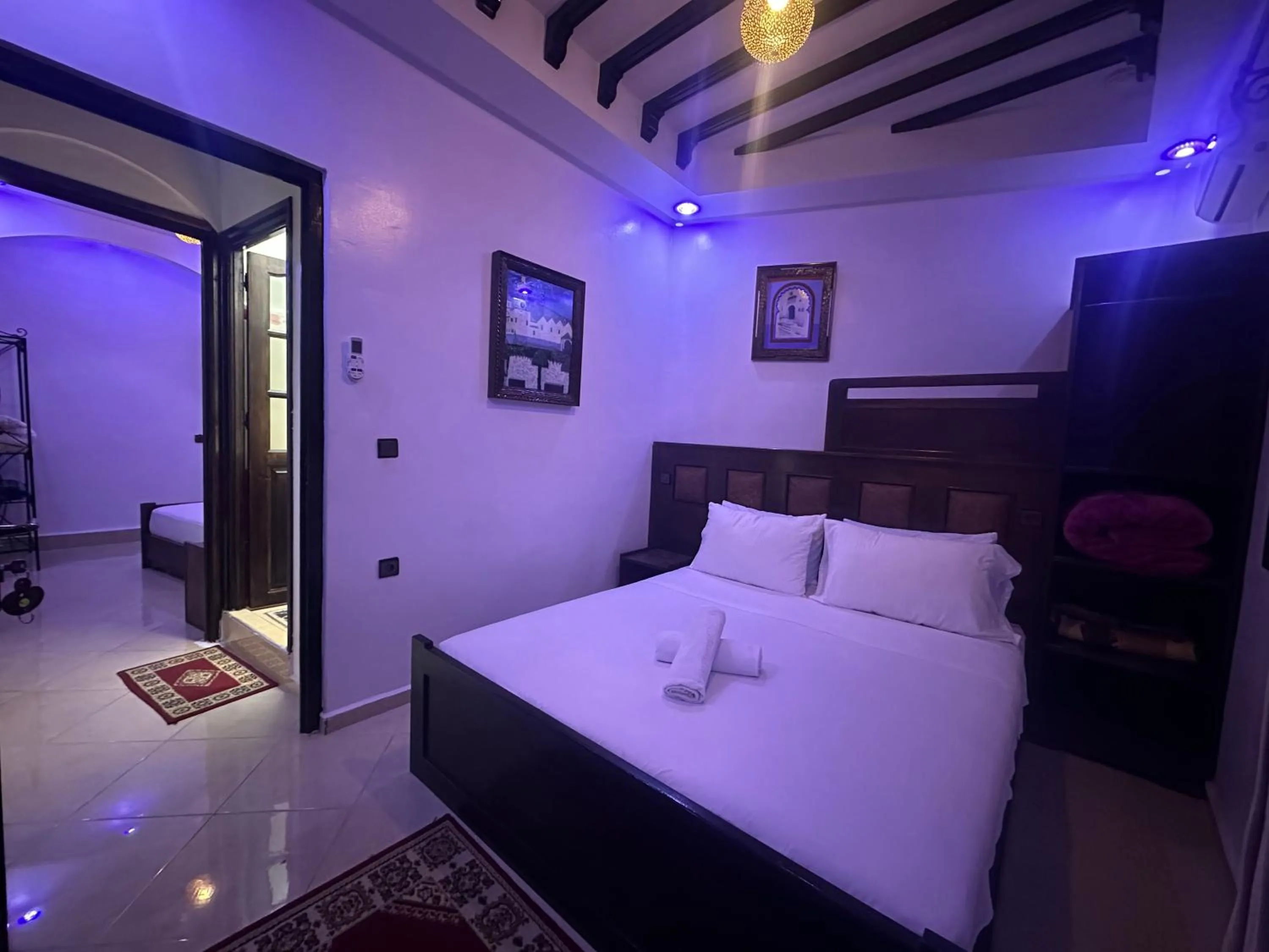 Bed in Maison d'hôtes Afassi