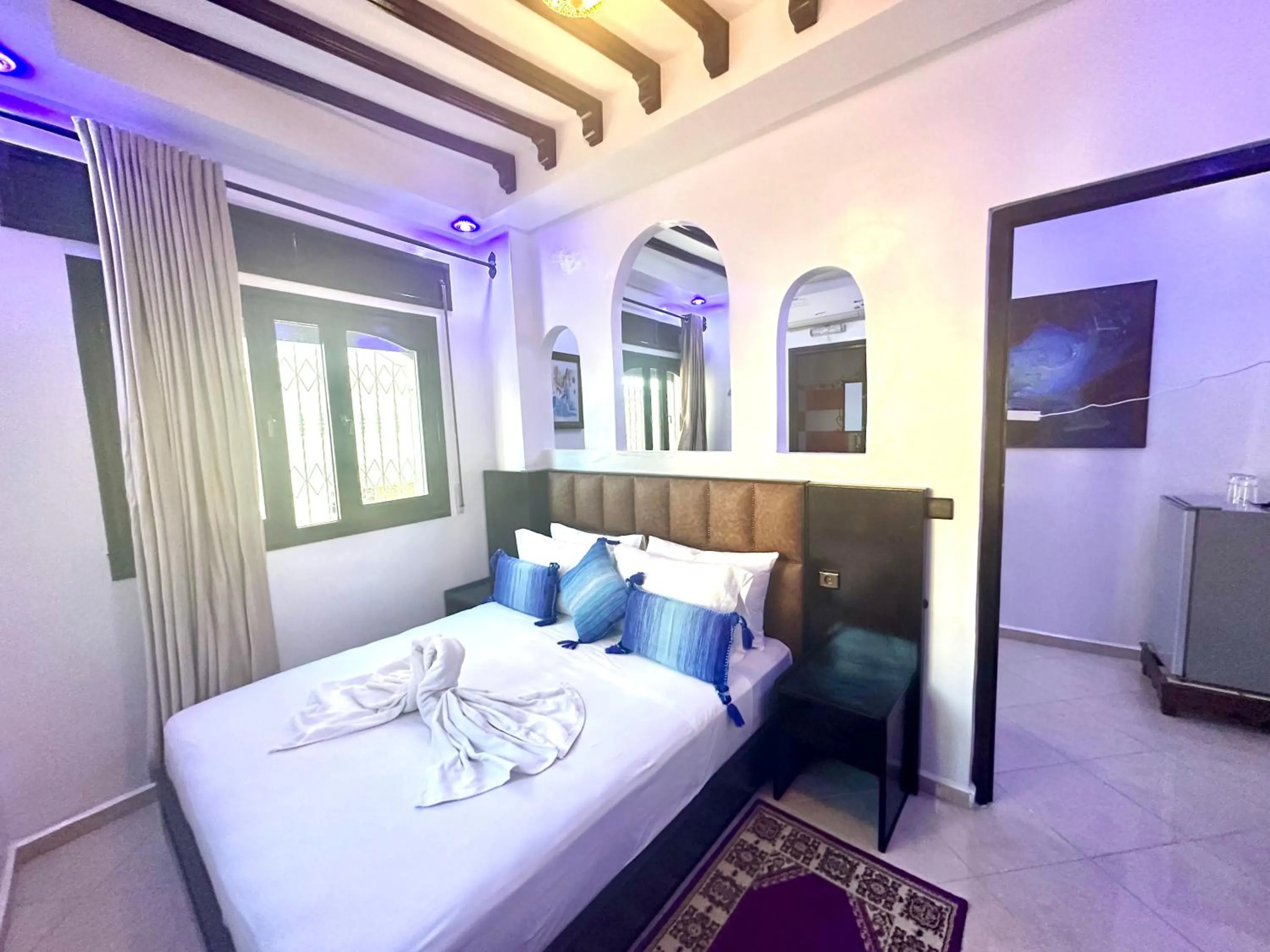 Bed in Maison d'hôtes Afassi