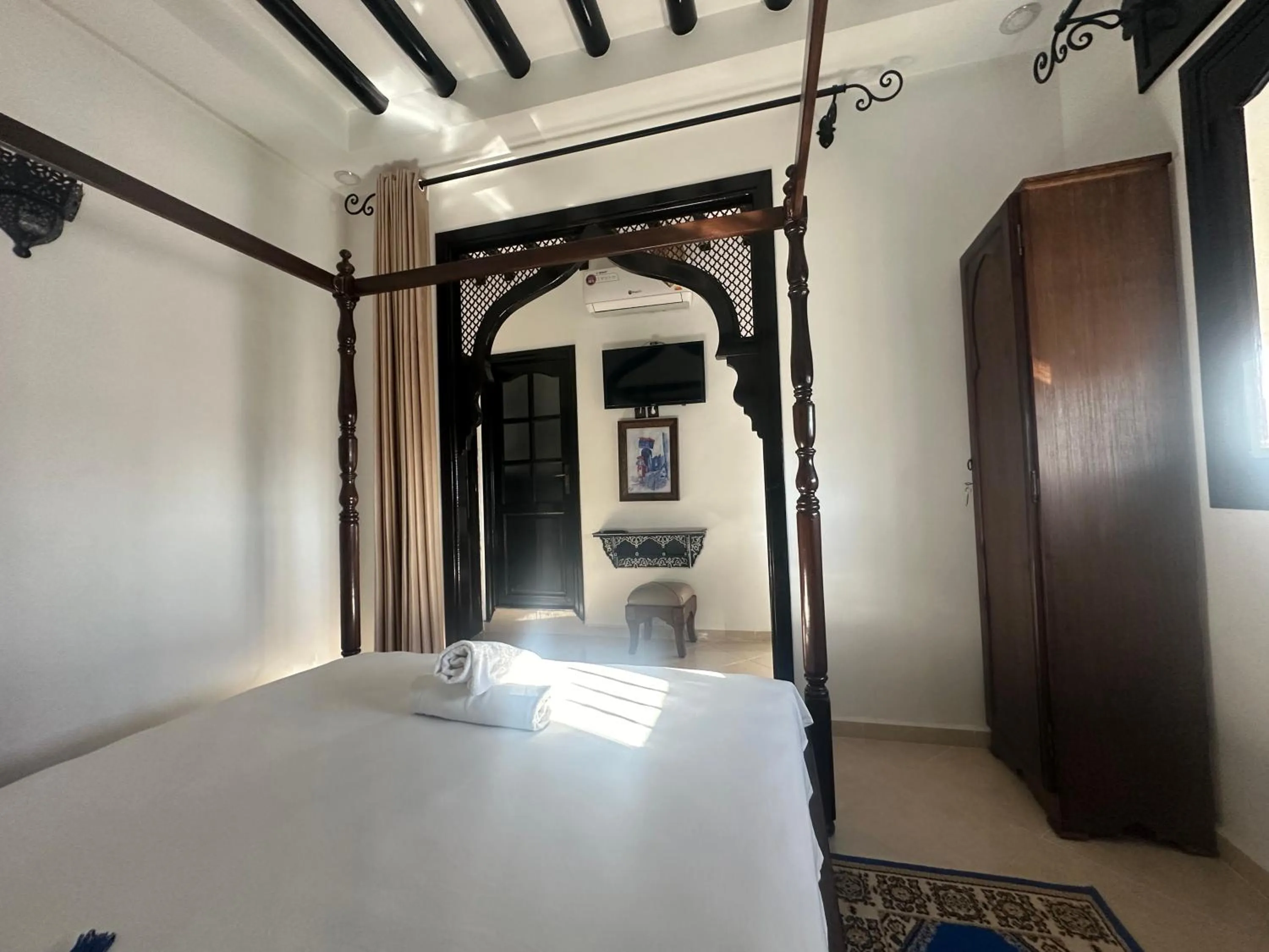 Bed in Maison d'hôtes Afassi