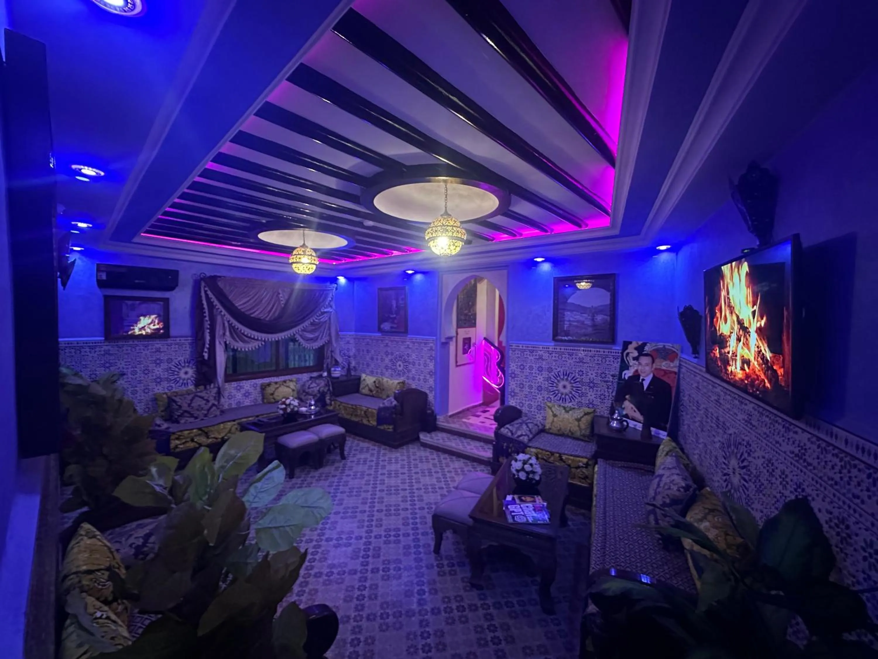 Communal lounge/ TV room in Maison d'hôtes Afassi