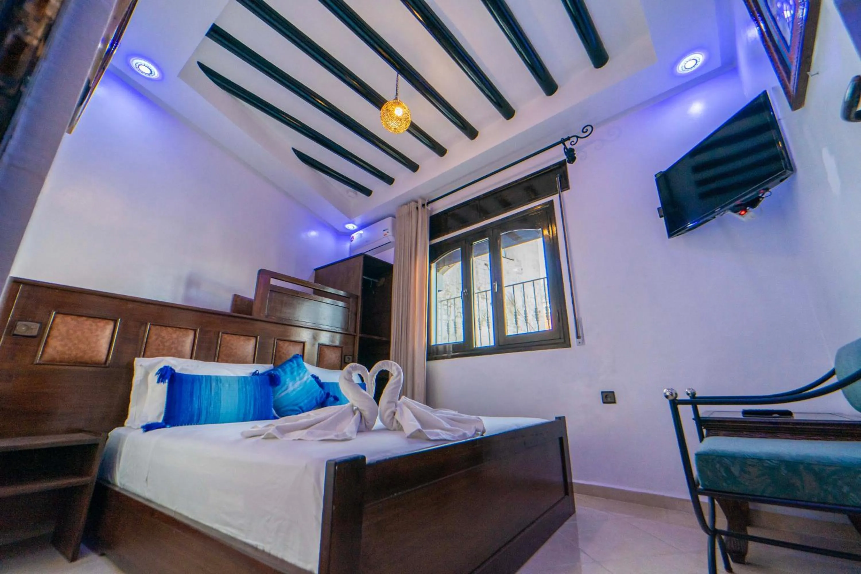 Bed in Maison d'hôtes Afassi