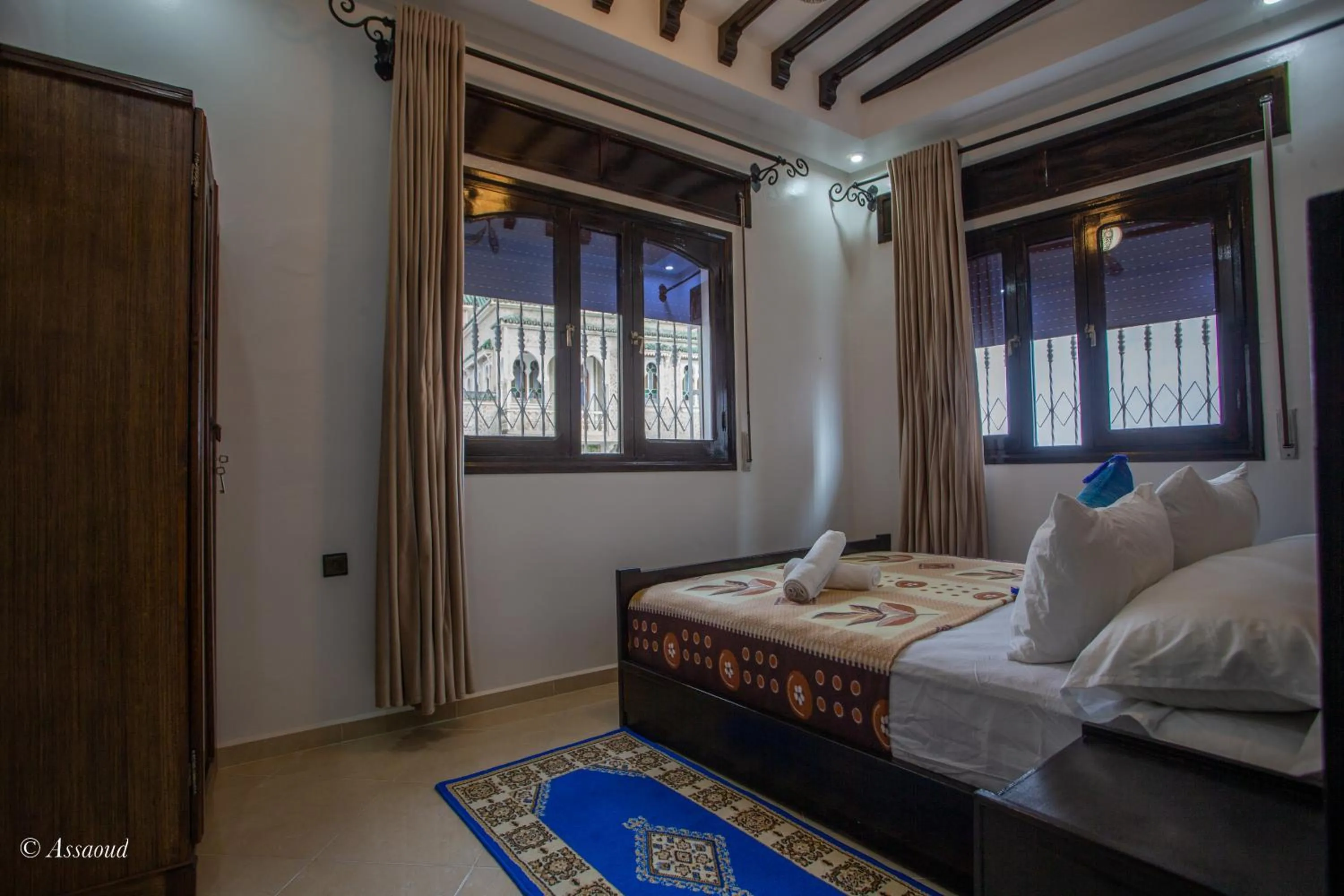 Bed in Maison d'hôtes Afassi