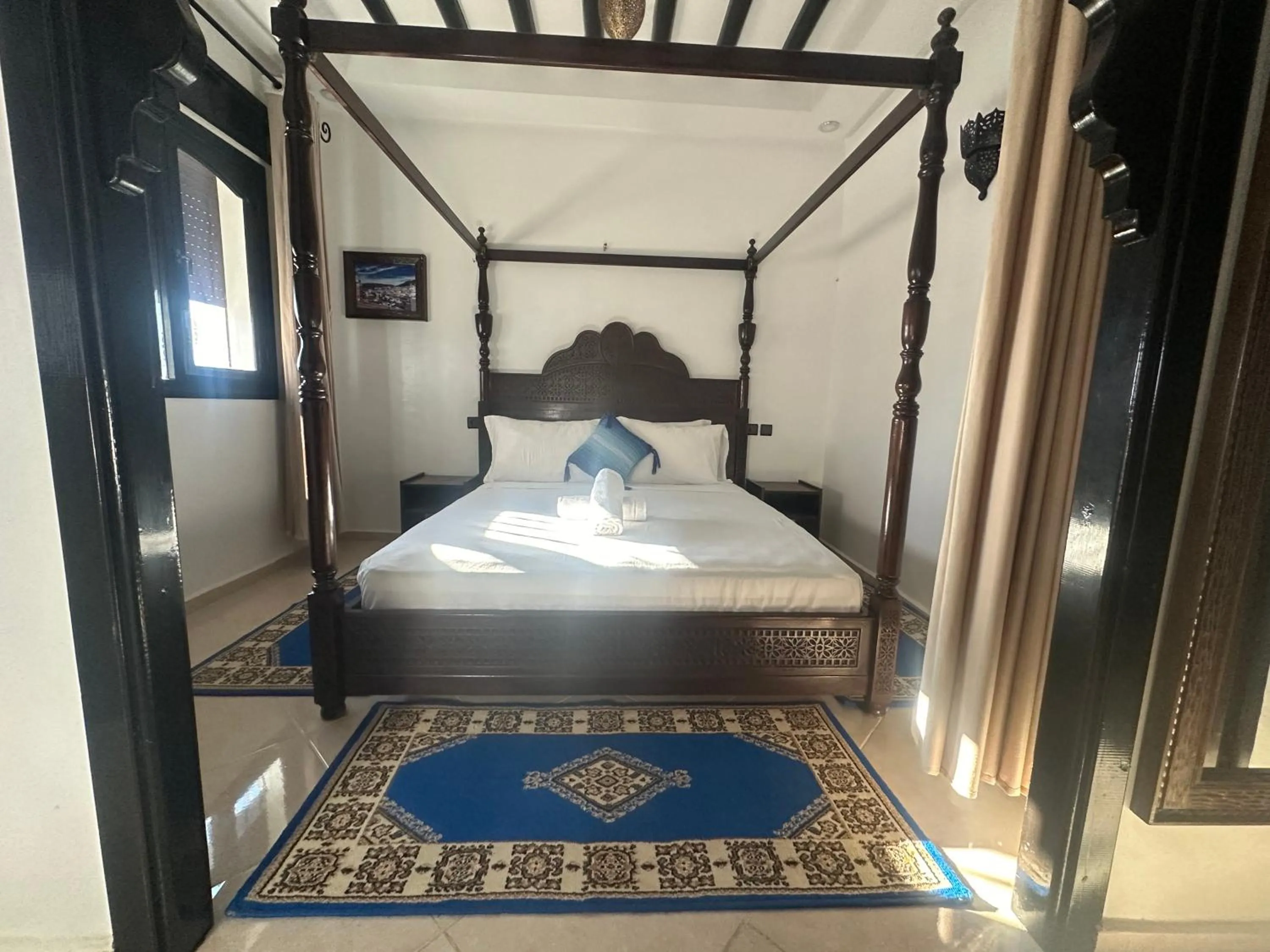 Bed in Maison d'hôtes Afassi