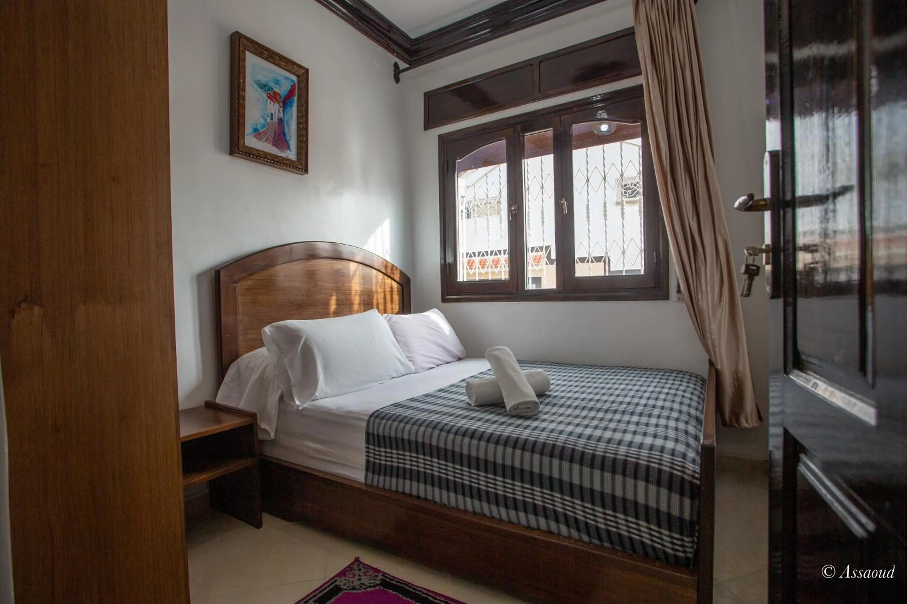 Bed in Maison d'hôtes Afassi