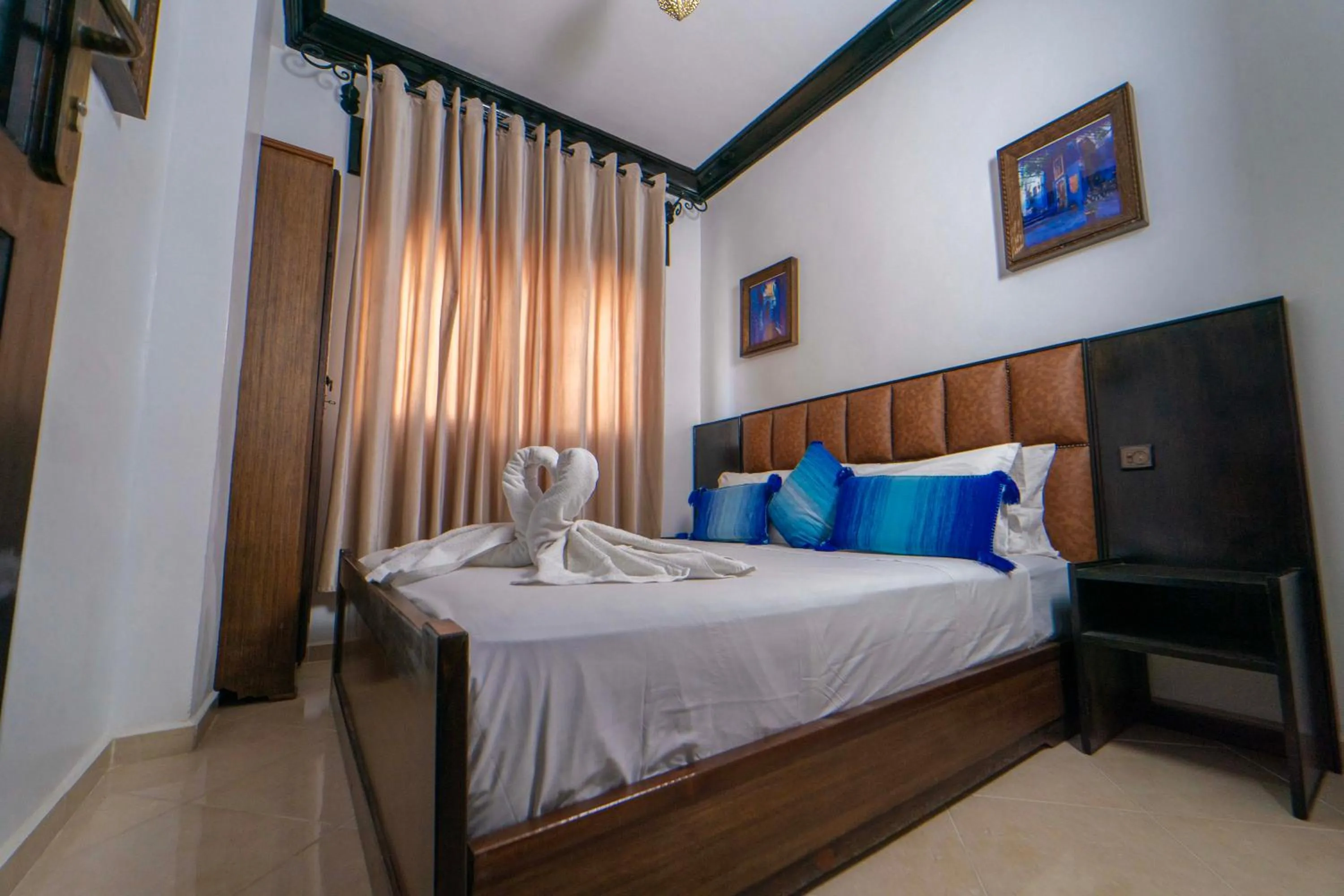 Bed in Maison d'hôtes Afassi