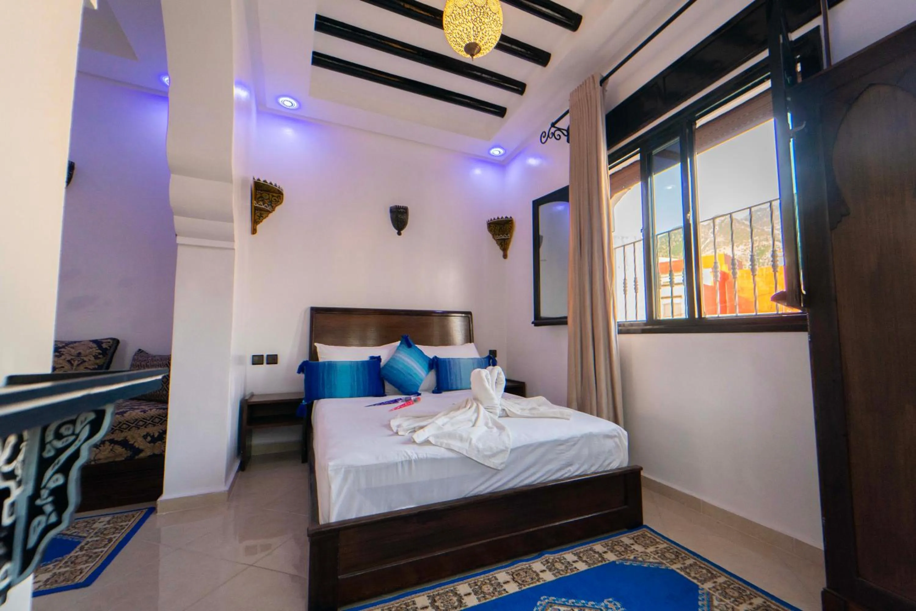 Bed in Maison d'hôtes Afassi