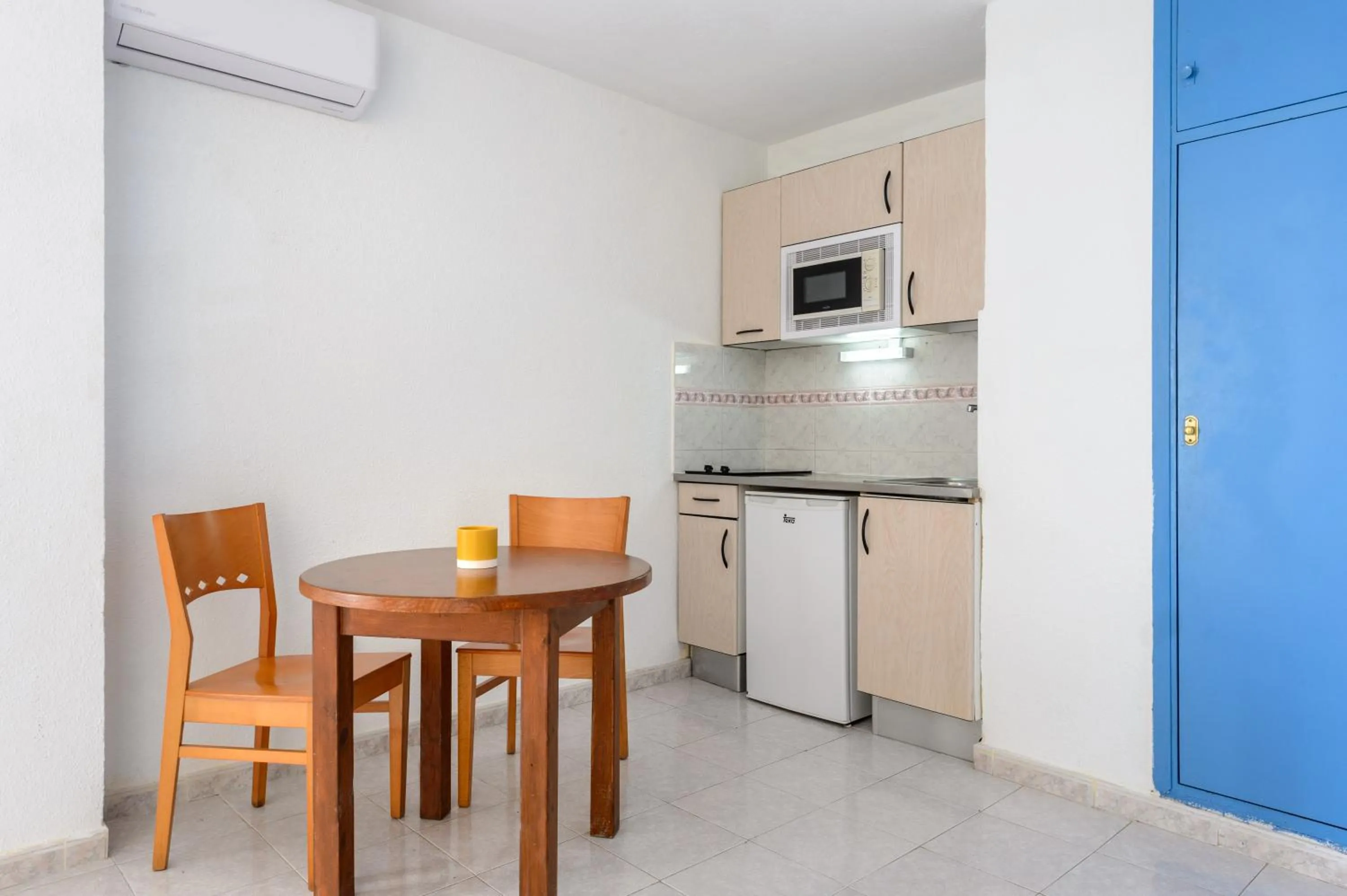Kitchen or kitchenette in Vibra Calima Apartamentos - Adults only
