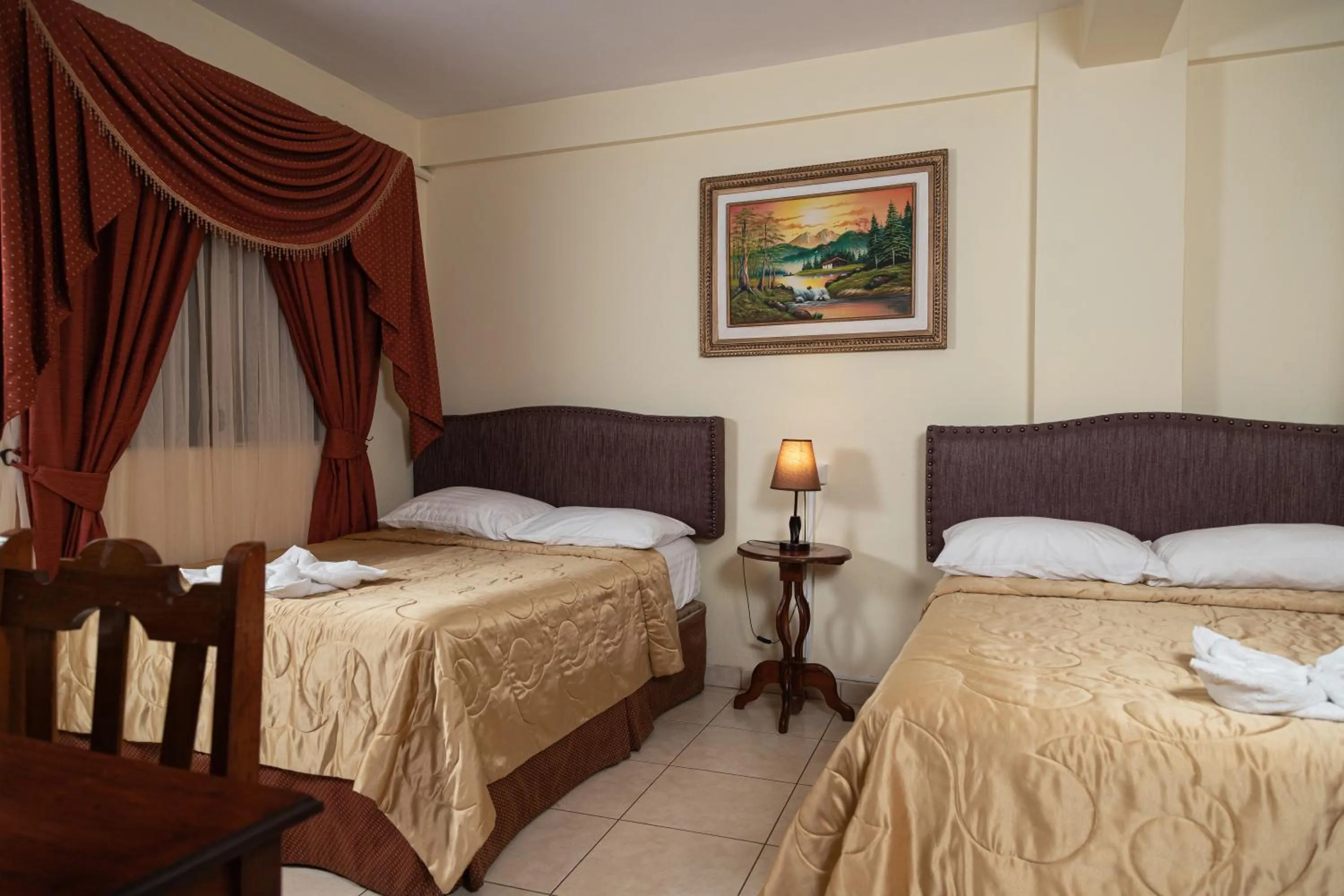 Bed in Hotel Internacional Palmerola