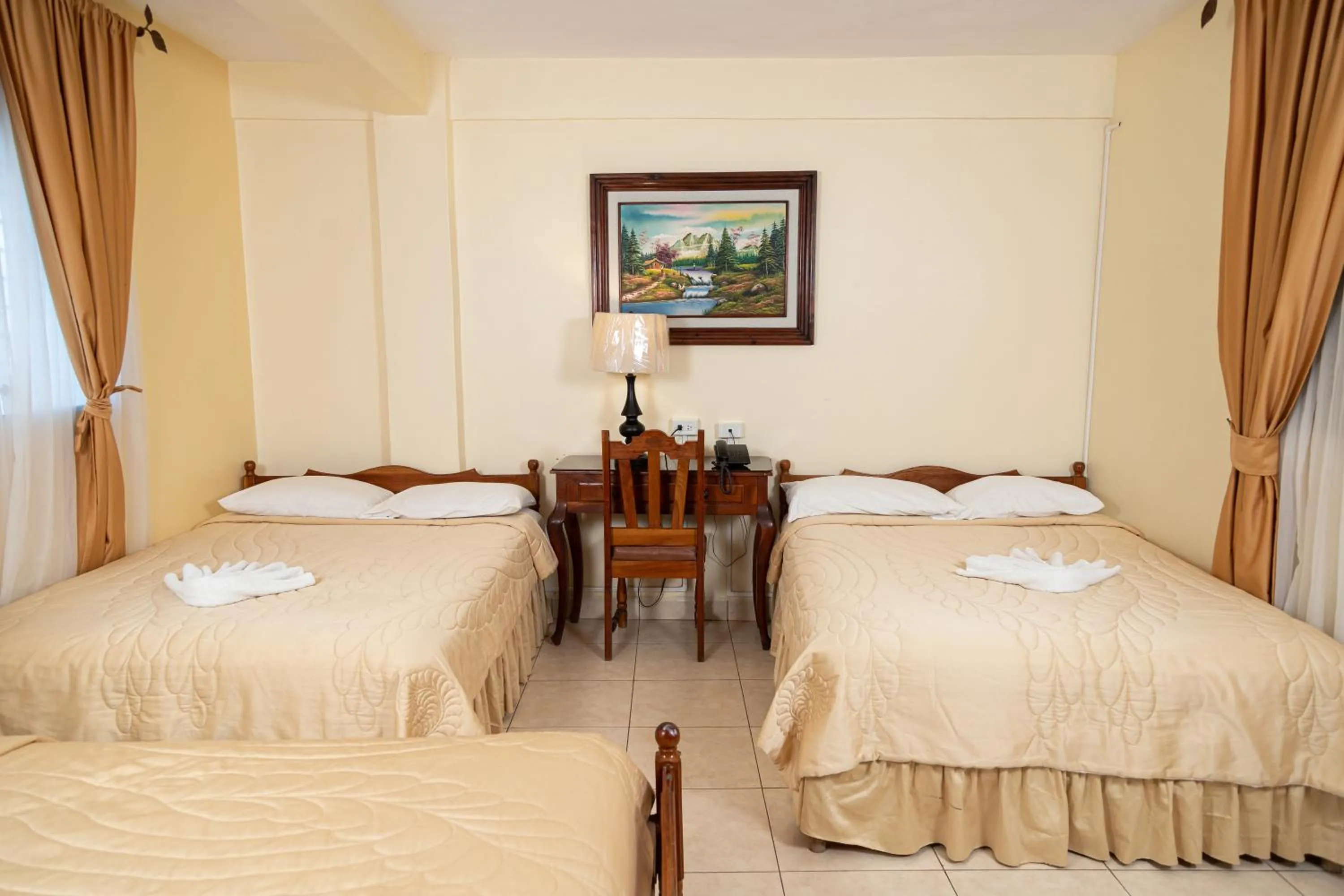 Bed in Hotel Internacional Palmerola