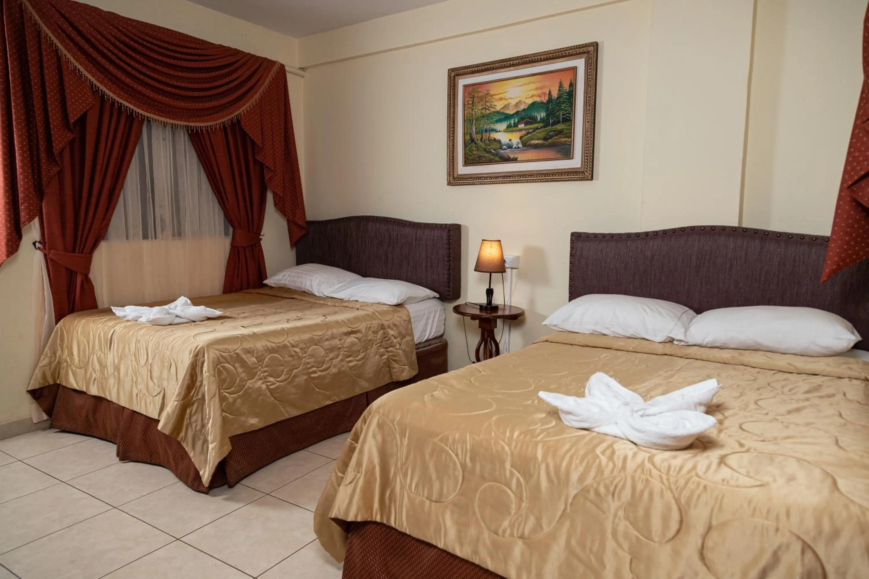 Bed in Hotel Internacional Palmerola