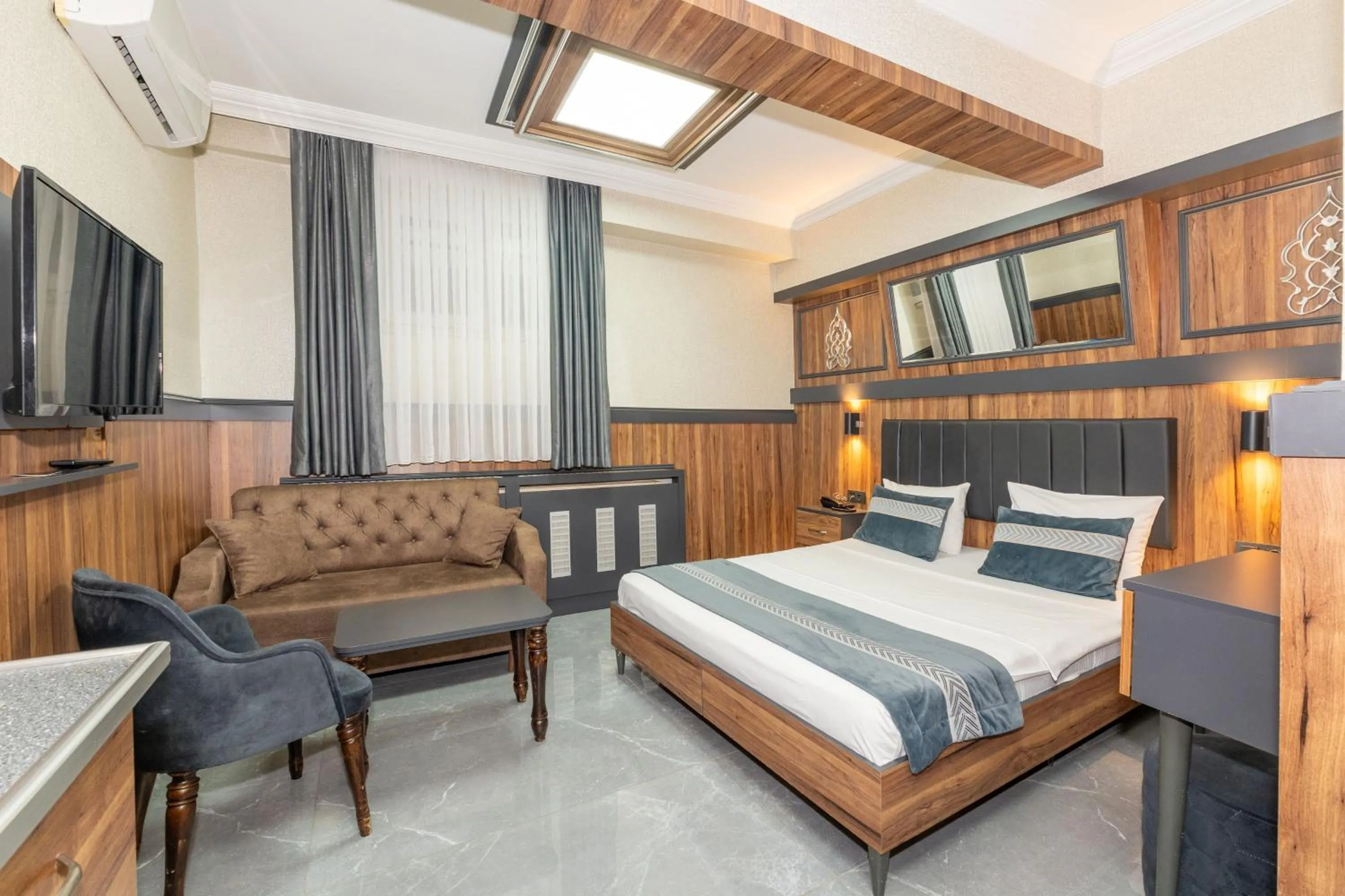 Bed in La Serena Taxim Hotel