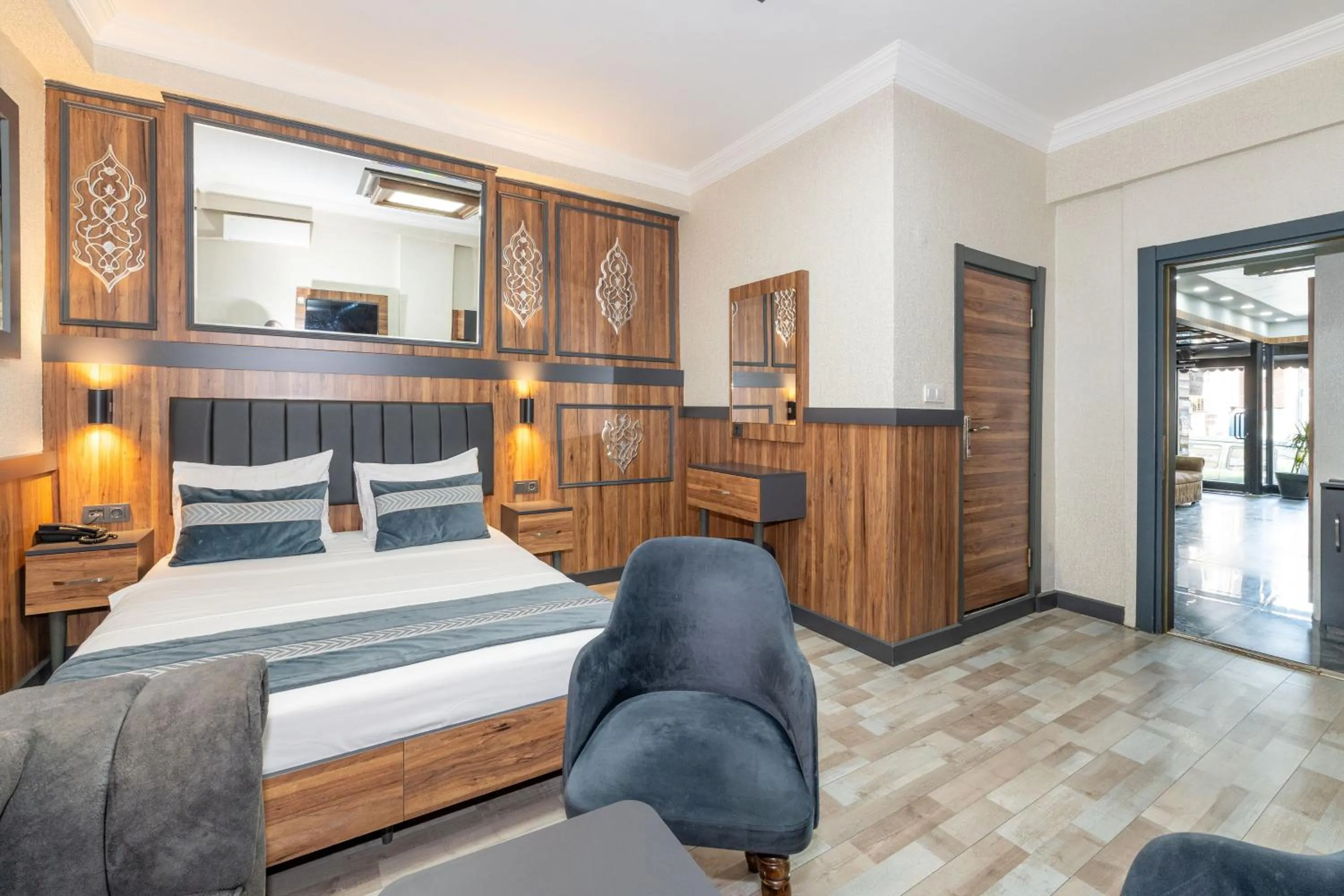 Bed in La Serena Taxim Hotel