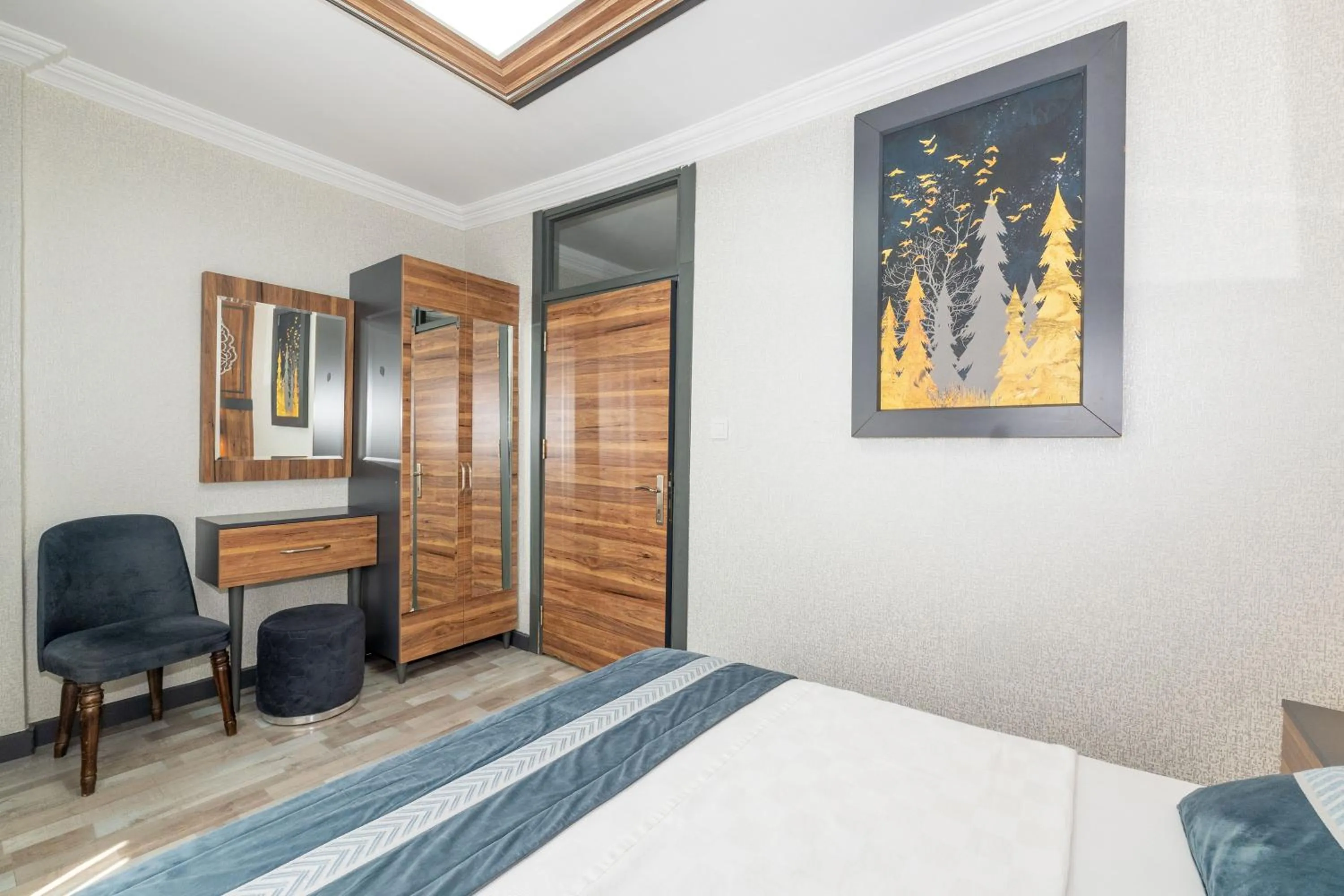 Bed in La Serena Taxim Hotel