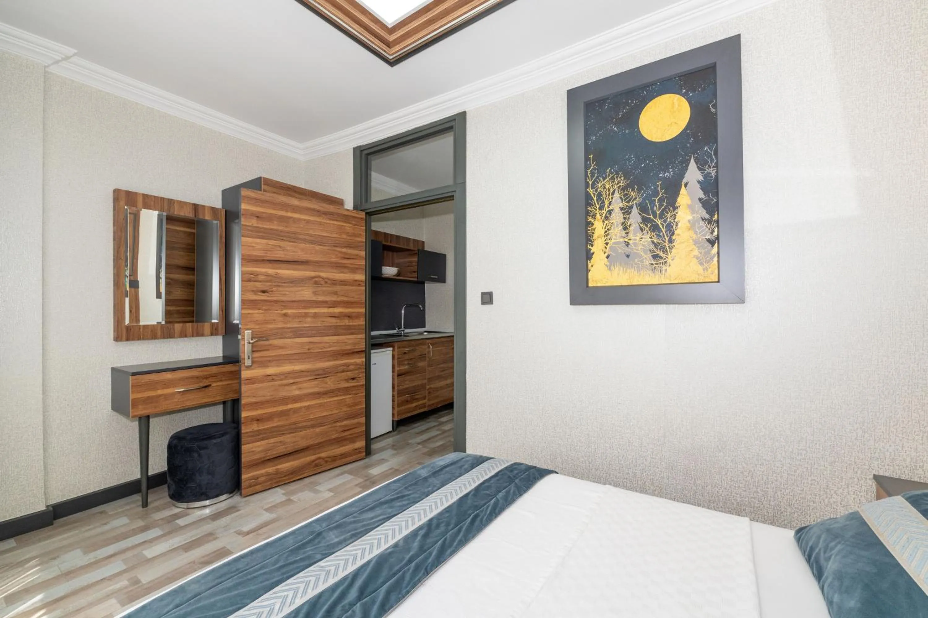 Bed in La Serena Taxim Hotel