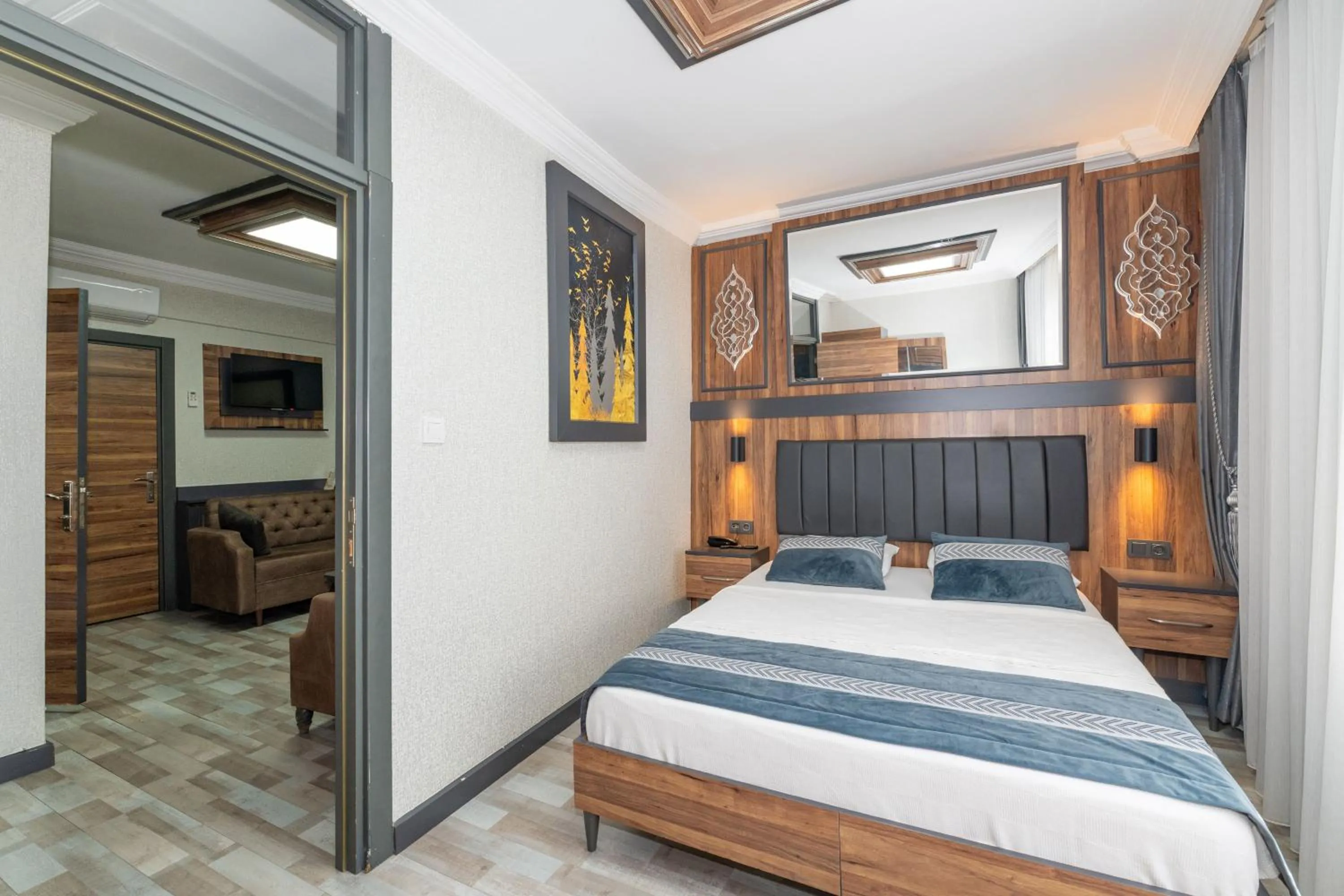 Bed in La Serena Taxim Hotel