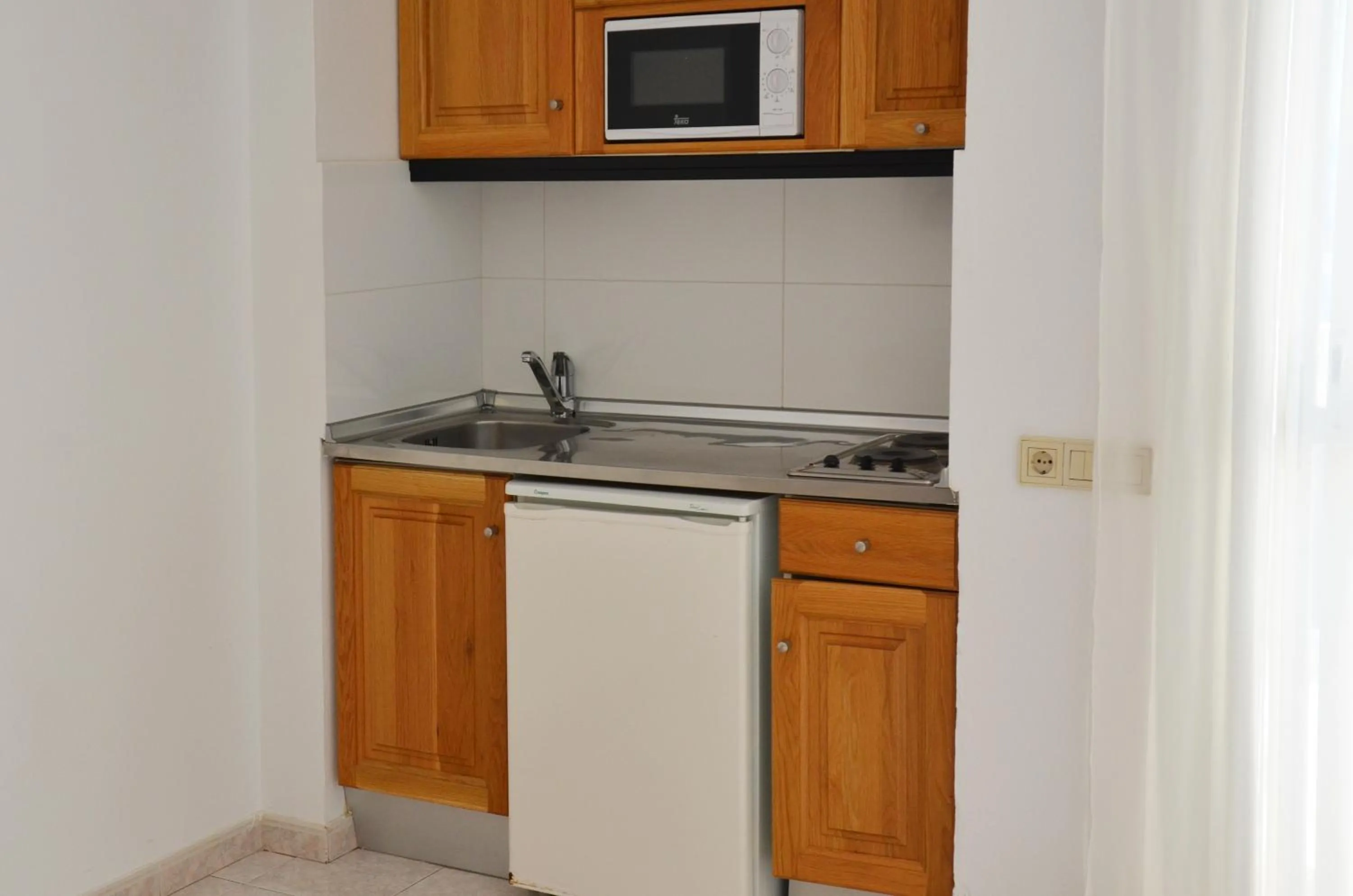 Kitchen or kitchenette in Apartamentos Vibra Panoramic