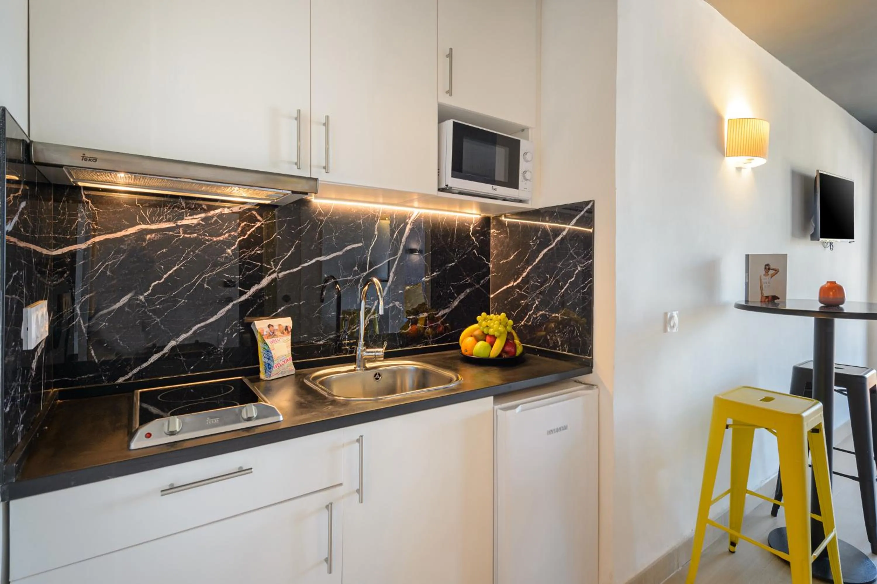 Kitchen or kitchenette in Apartamentos Vibra Jabeque Dreams