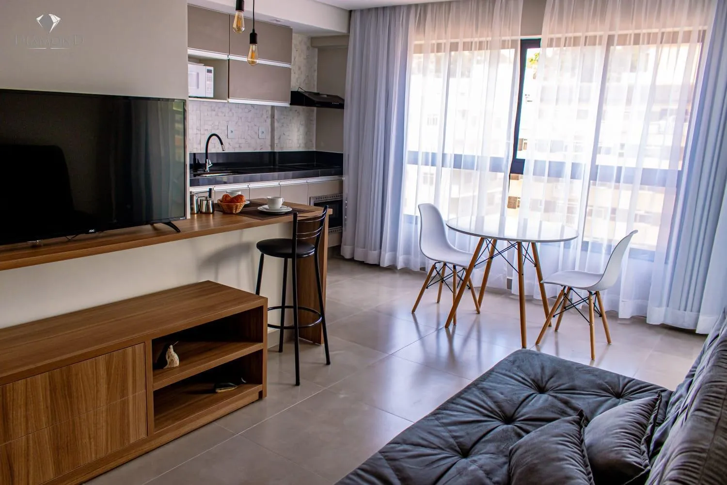 Communal lounge/ TV room in Diamond Hotéis e Flats