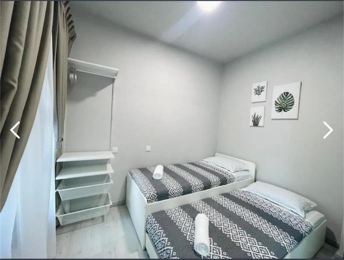 Bed in TF Sunset Ocean View Homestay - Jesselton Quay