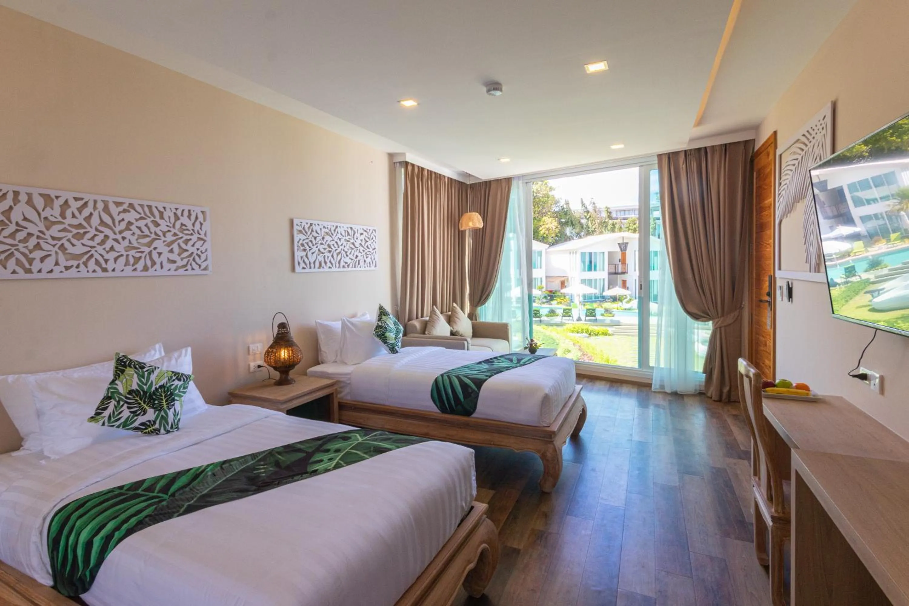 TV and multimedia, Bed in Vannee Golden Sands Beachfront Resort