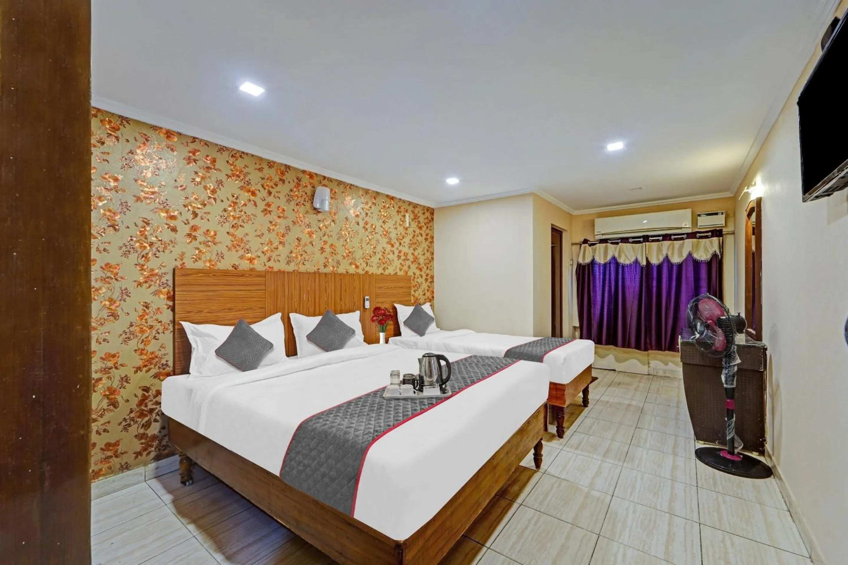 Bedroom in Collection O Pride Hospitality US Consulate