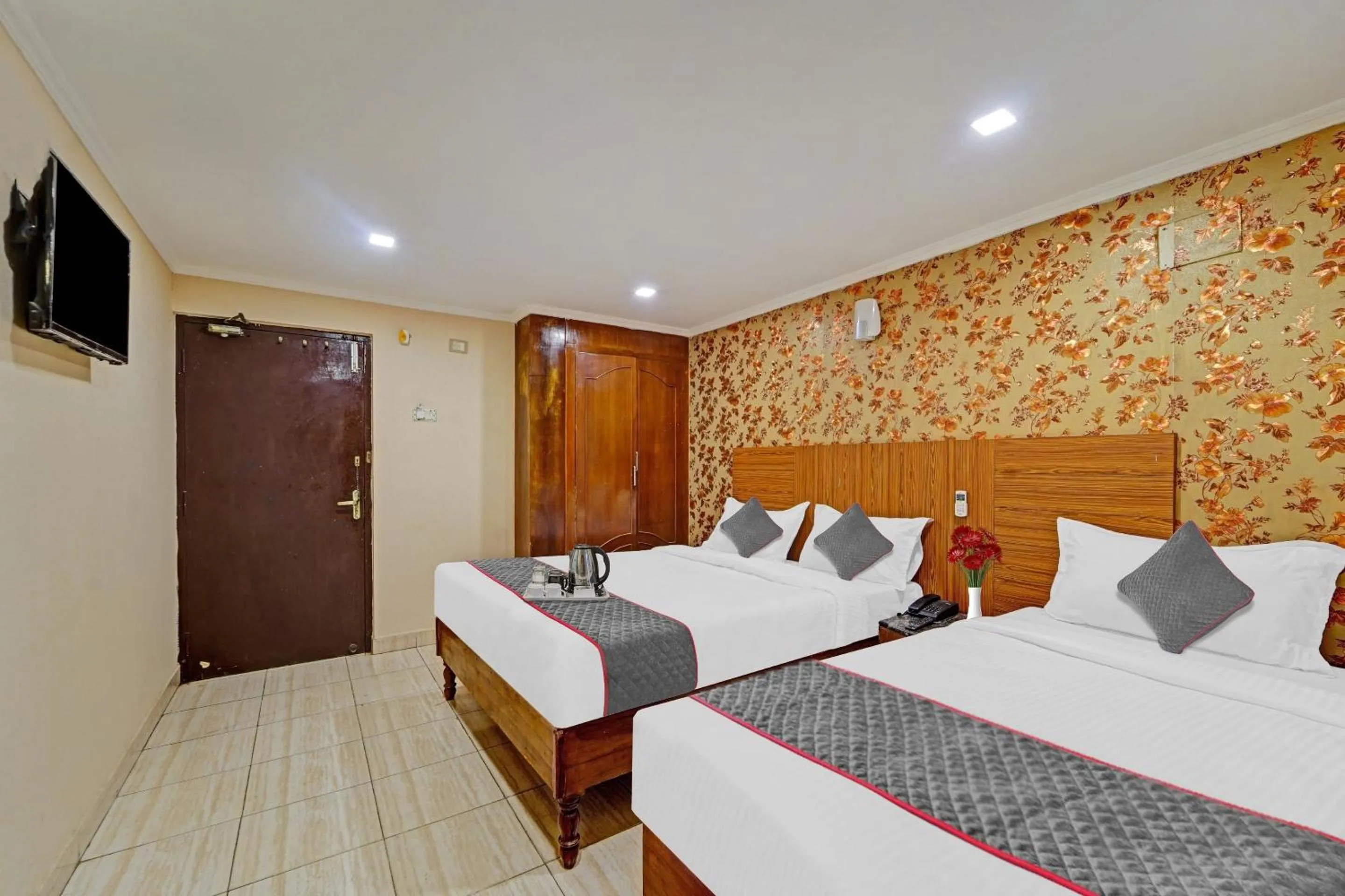 Bedroom in Collection O Pride Hospitality US Consulate