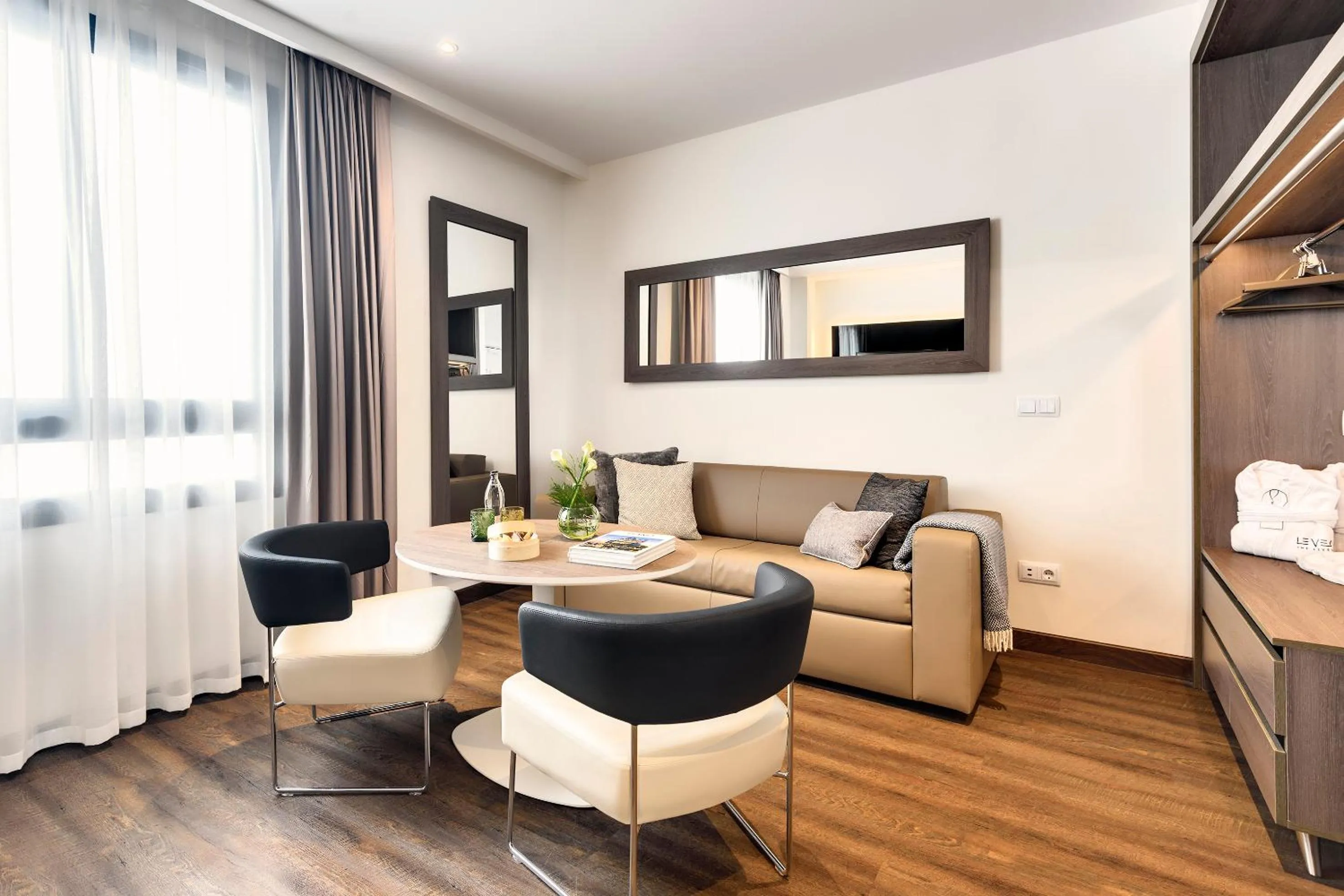 Living room in Melia Madrid Serrano