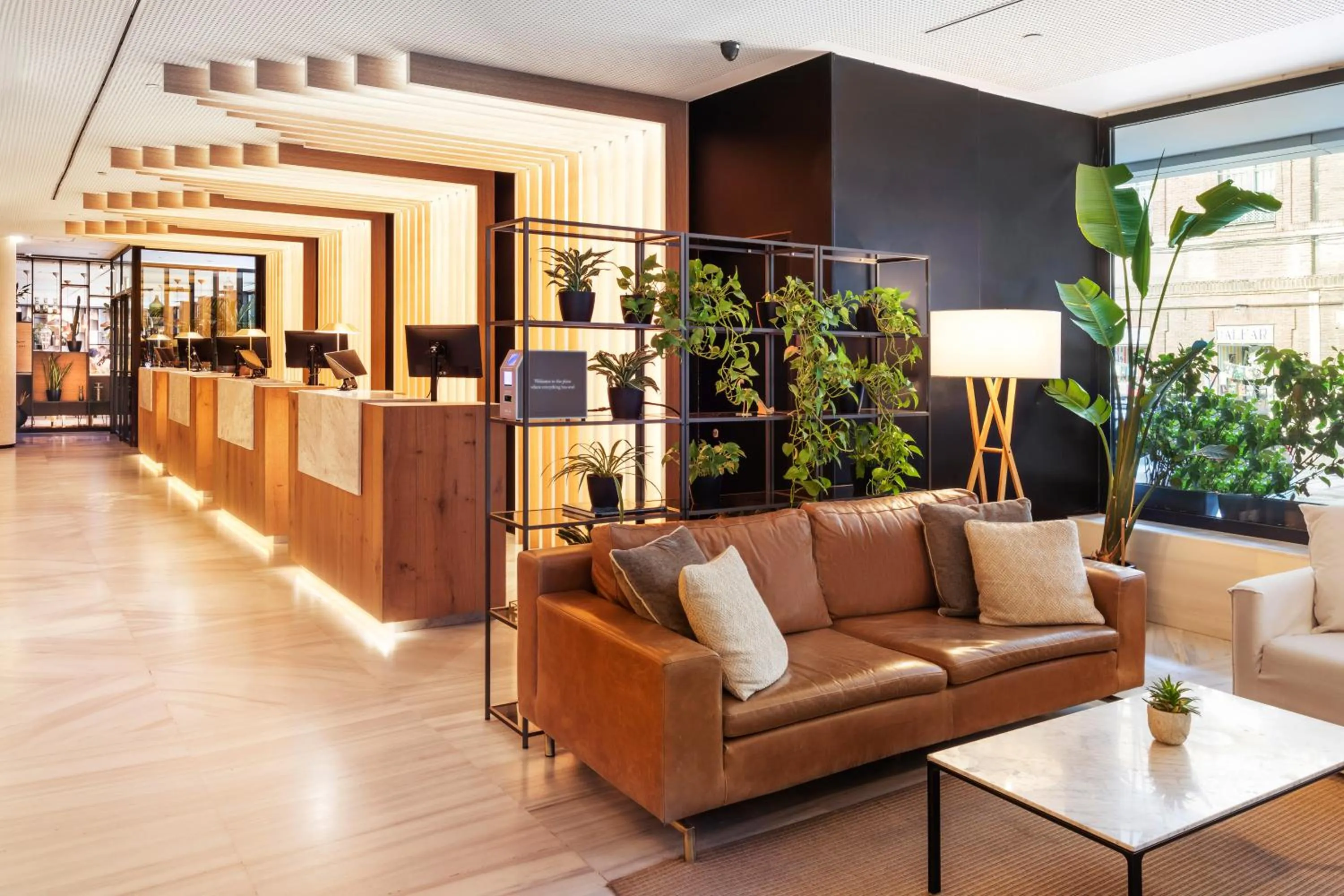 Lobby or reception in Melia Madrid Serrano