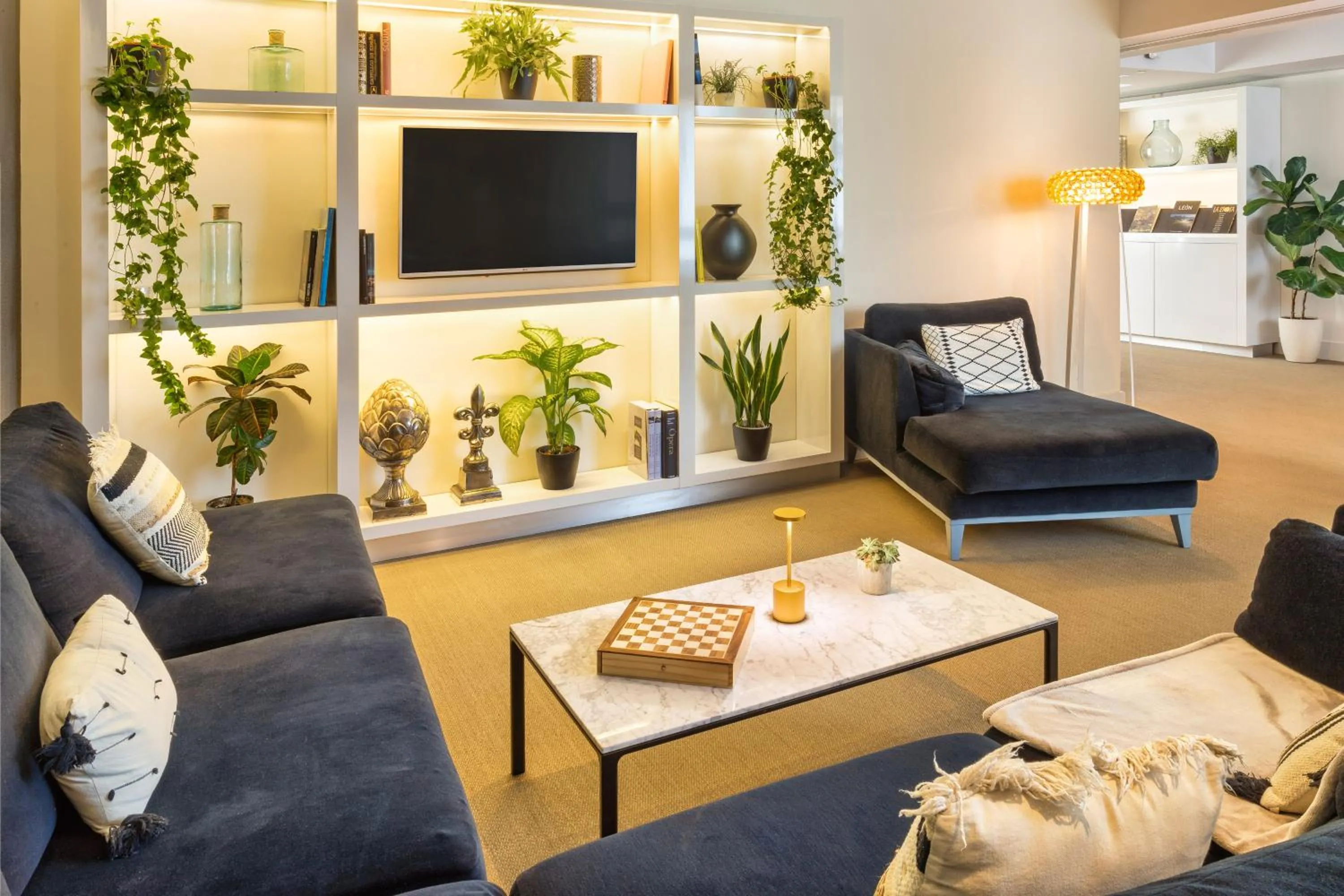 Living room in Melia Madrid Serrano