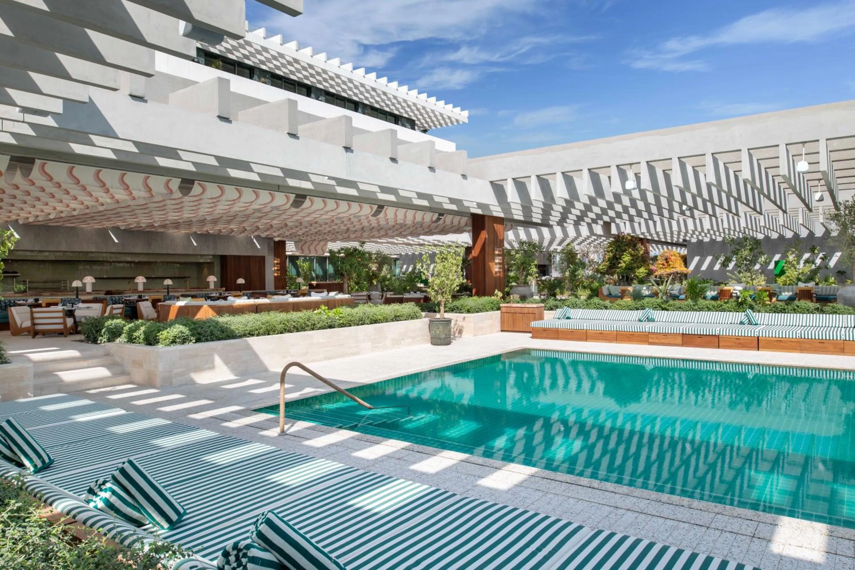 Swimming pool in The Ned Doha